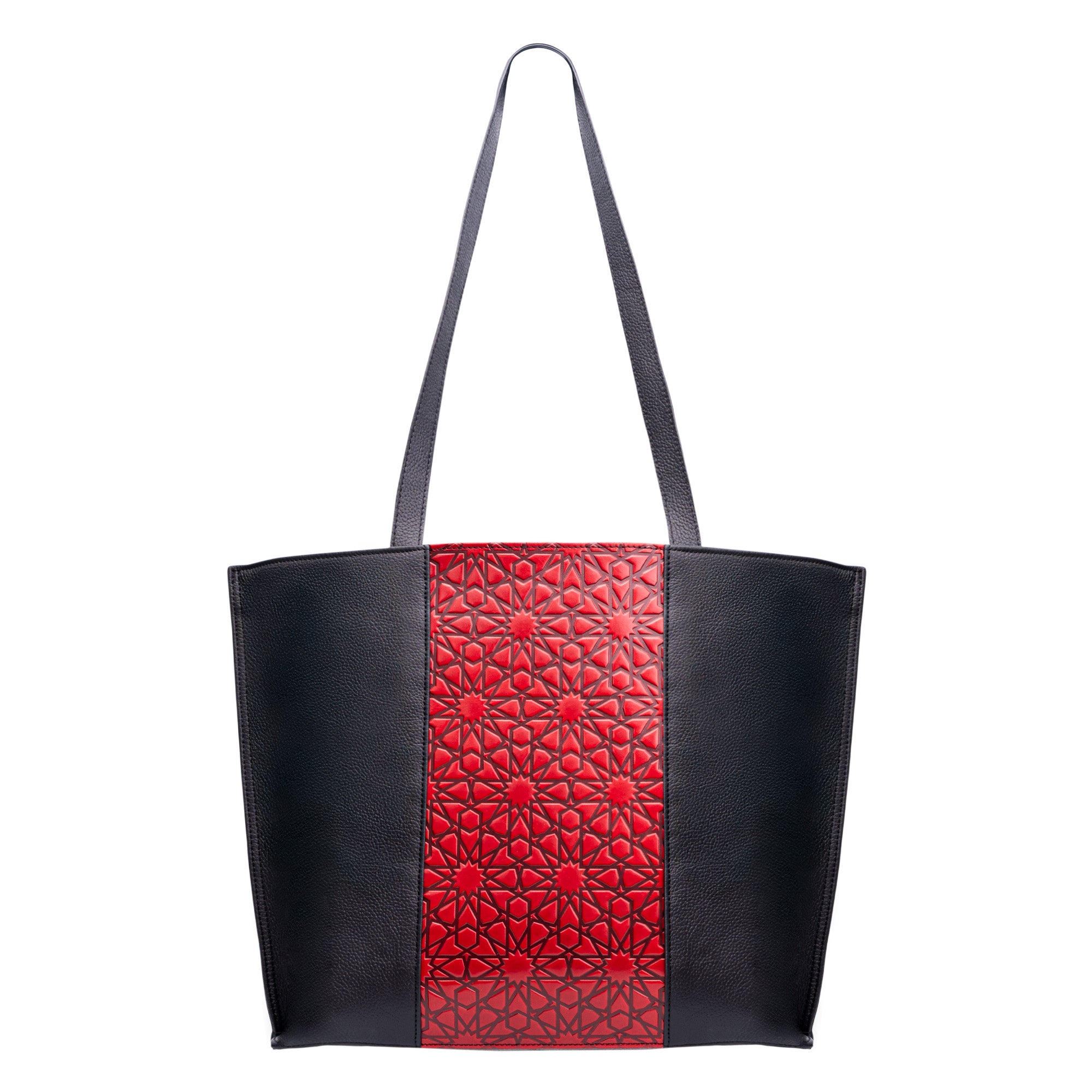 This Leather Tote Bag features a black leather body, long straps, a central red panel crafted from premium Spanish leather, and an embossed Islamic art pattern.