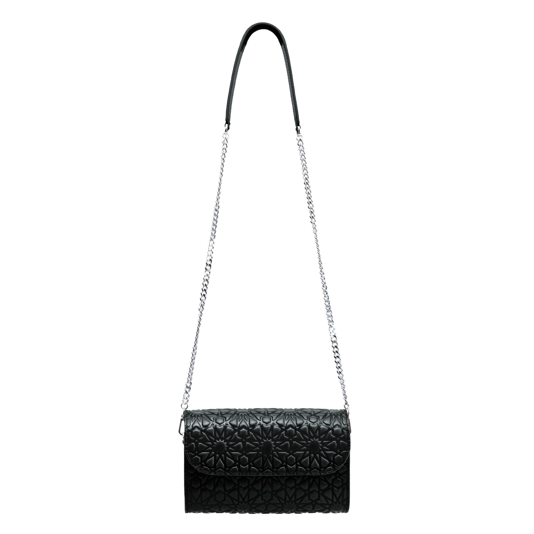 The Small Black Leather Bag Bayarcal is a handmade Spanish shoulder bag with a black quilted design, flap closure, silver chain strap, and geometric textured front. Shown against a white background.