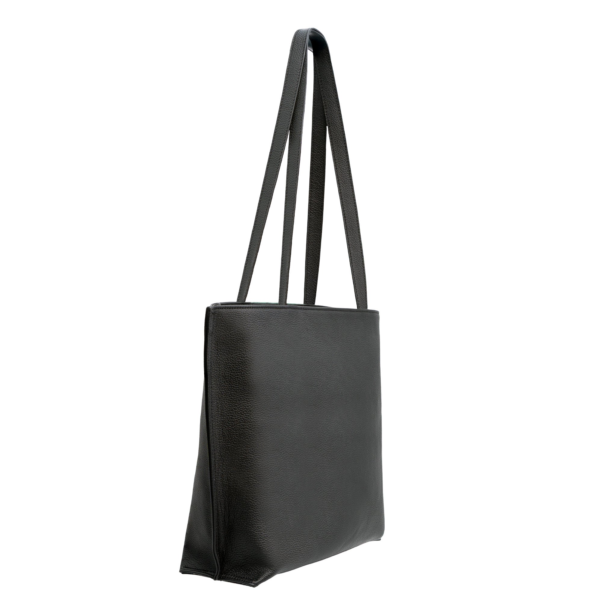 The Leather Tote Bag Green and Black - Alhambra Pattern Embossed features premium Spanish leather with a pebbled texture, double shoulder straps, and a minimalist rectangular design. Shown at an angle on a white background.