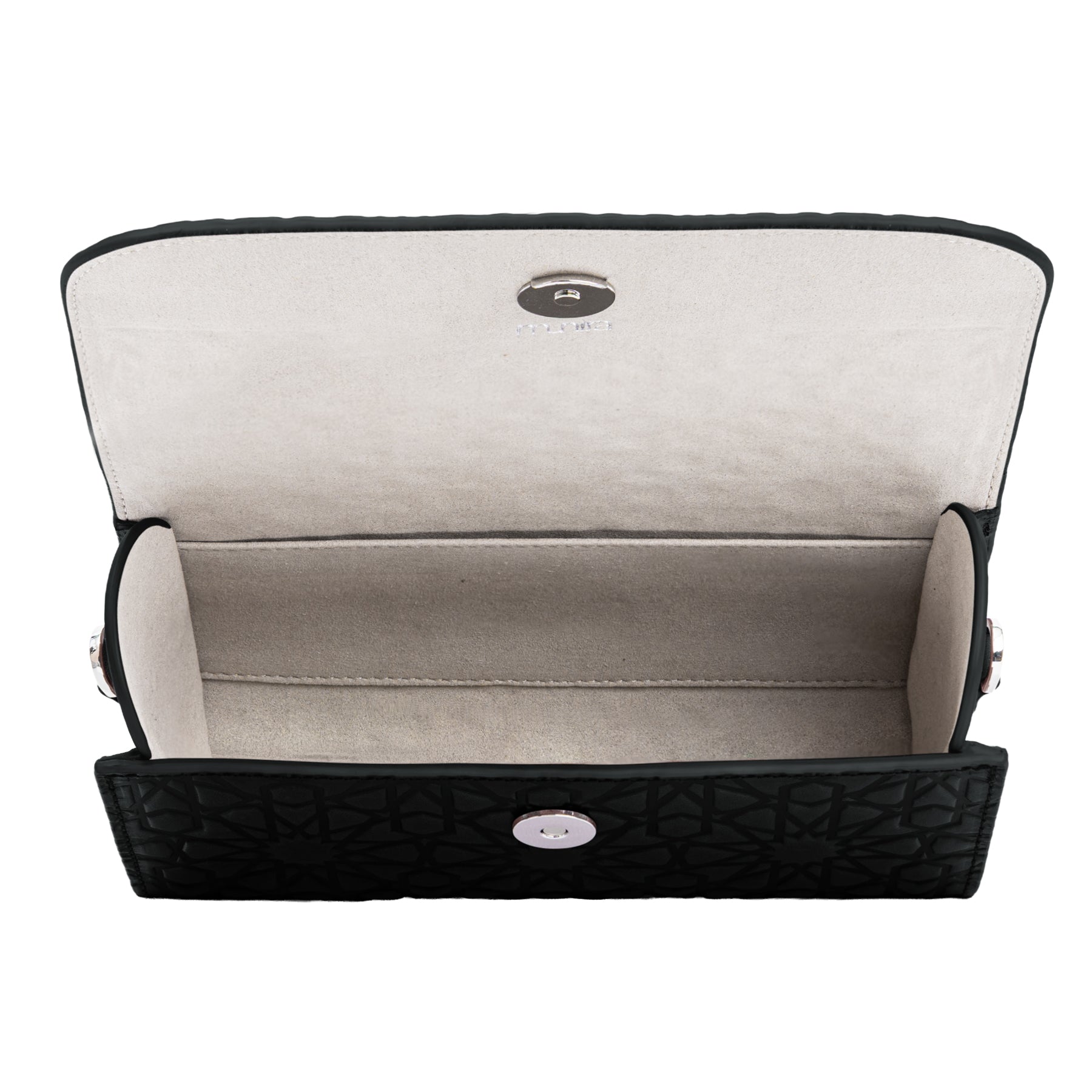 The Small Black Leather Bag Bayarcal is a handmade, open black quilted clutch with a light beige suede interior, crafted in Spain from vegetable-tanned leather. Viewed from above, it shows a spacious compartment and magnetic snap closure.