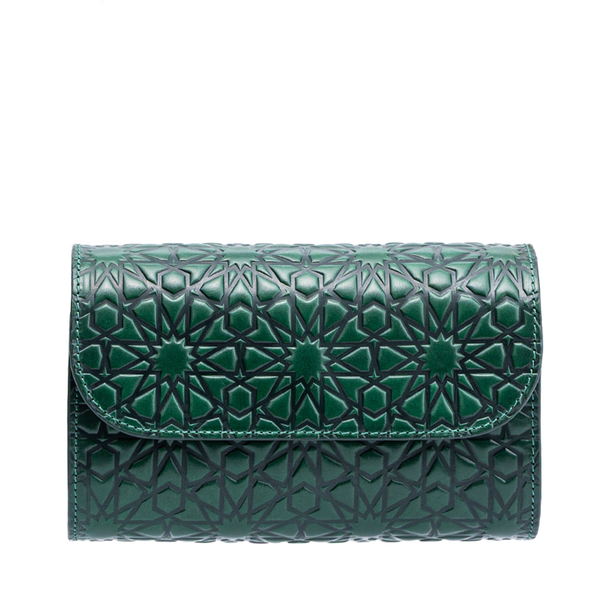 The Small Embossed Leather Bag in Dark Green - Bayarcal is an eco-friendly clutch with a flap closure, handcrafted in Spain and featuring Islamic geometric embossing with an intricate star pattern.