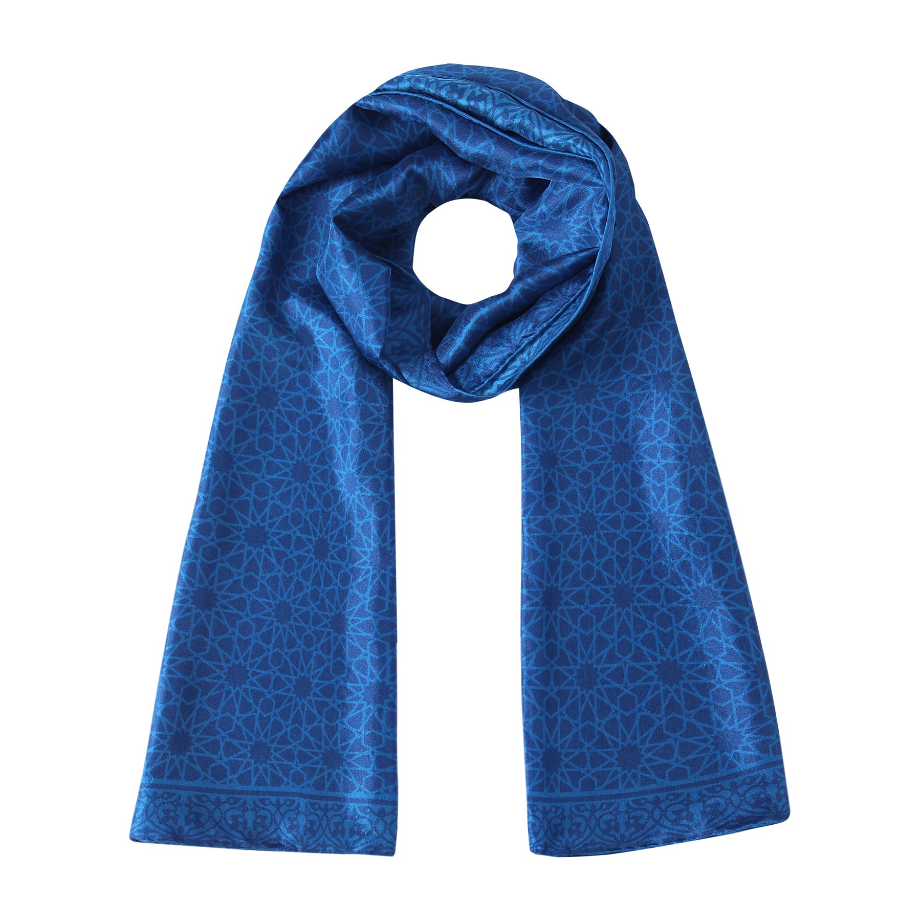 The Blue Silk Scarf Dalila folded, showing the Dalila Al-Andalus mosaic print in blue on natural Habotai silk.