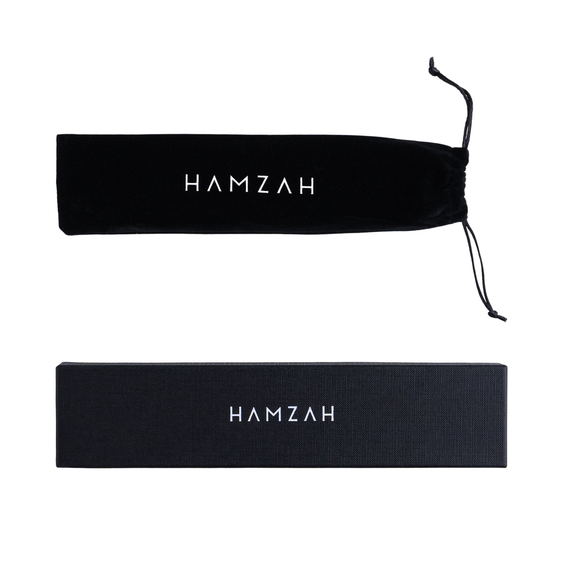 Two black cases with "HAMZAH" in white: a drawstring pouch for the Spanish Hand Fan with Floral Print Georg, and a rectangular box. Both are shown on a white background.