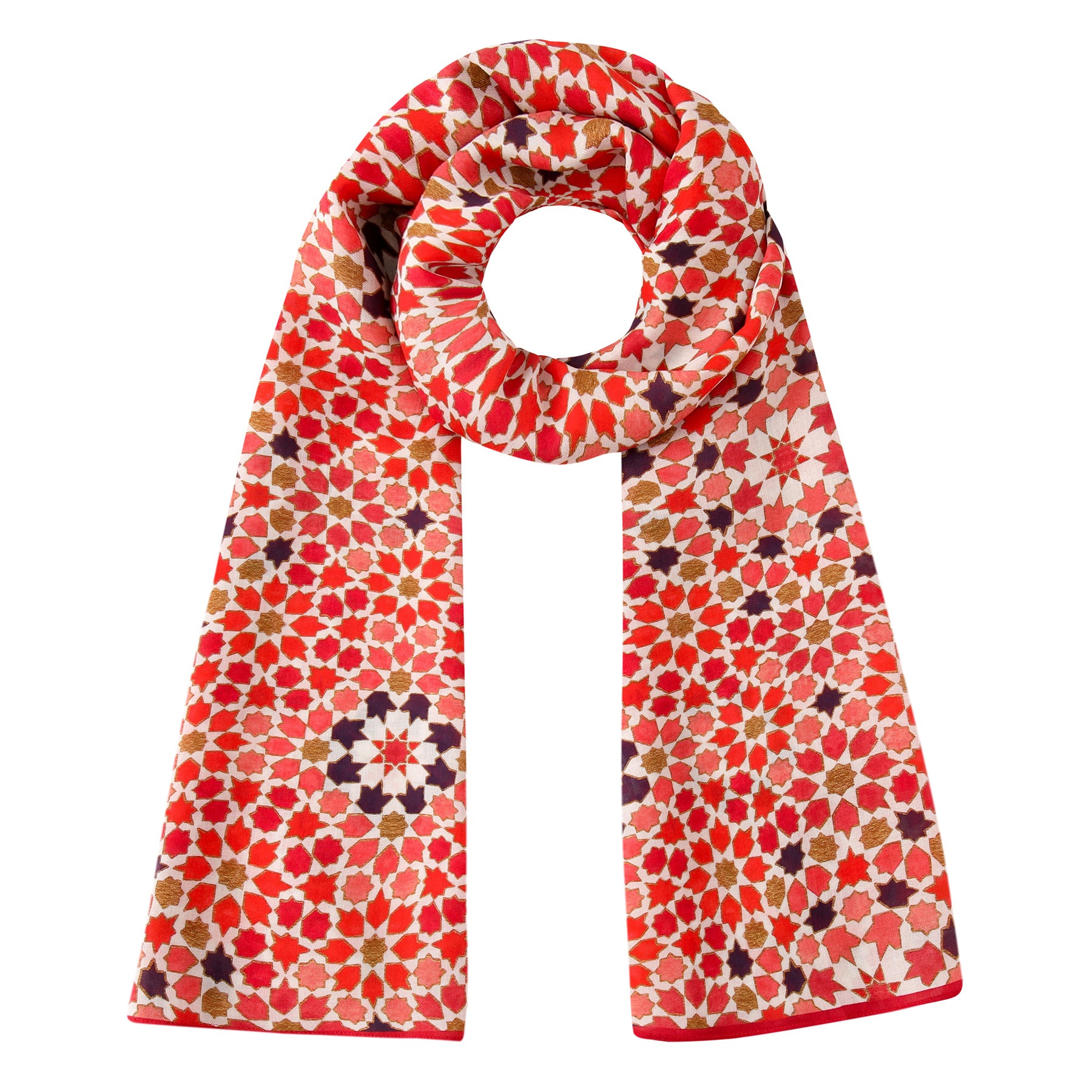 The Modal Hijab with Islamic Design Red - Alhambra features a geometric, mosaic-inspired pattern in red, orange, white, and brown, styled in a neat circular knot.