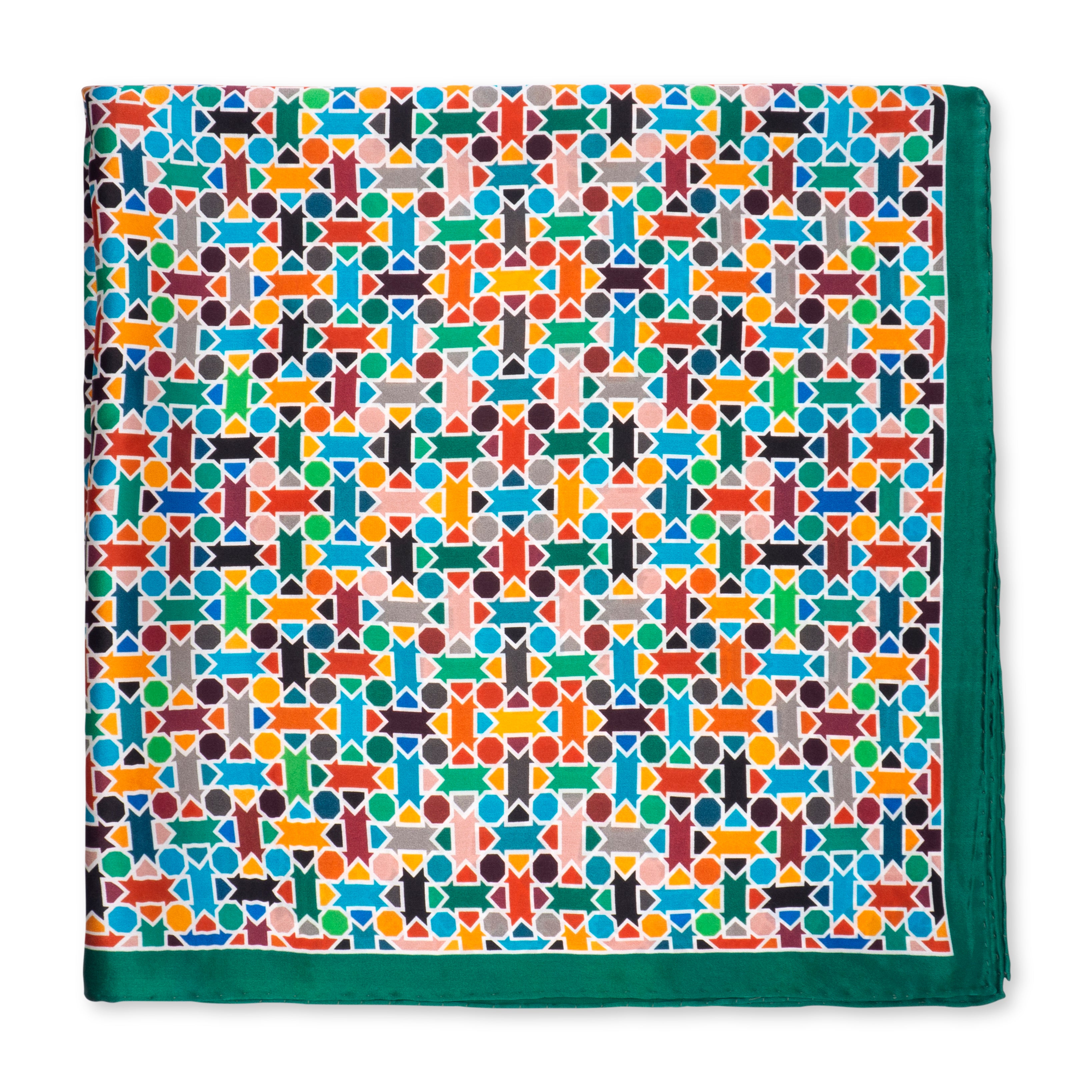 The Multicolor Silk Square Scarf Amal features a vibrant geometric pattern in blue, orange, red, green, and yellow, solid green borders, and hand rolled hems.