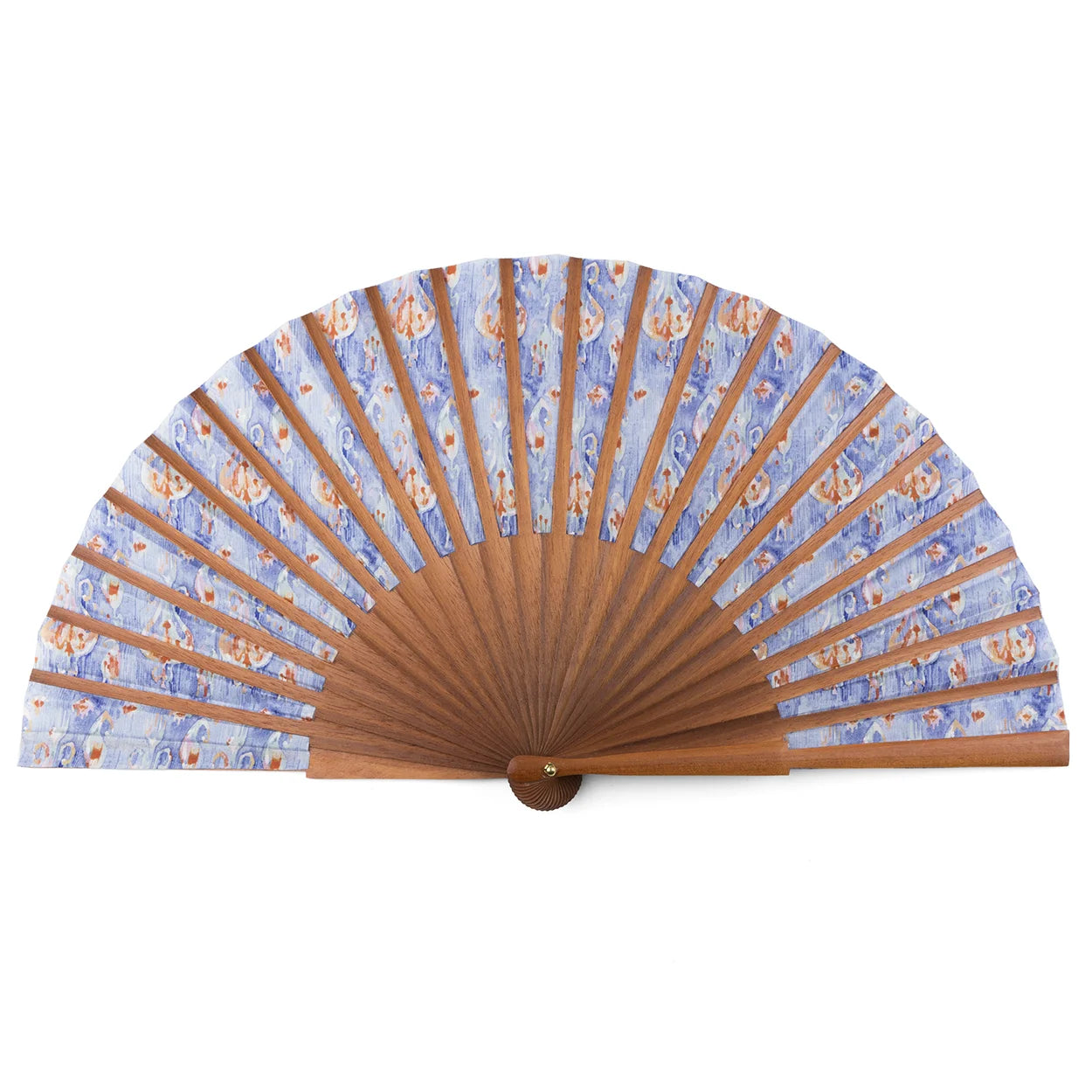 The Blue and Orange Handcrafted Ikat-Inspired Silk Fan features brown wooden ribs and a blue silk leaf with intricate Ikat designs in orange and white, shown fully open against a white background.