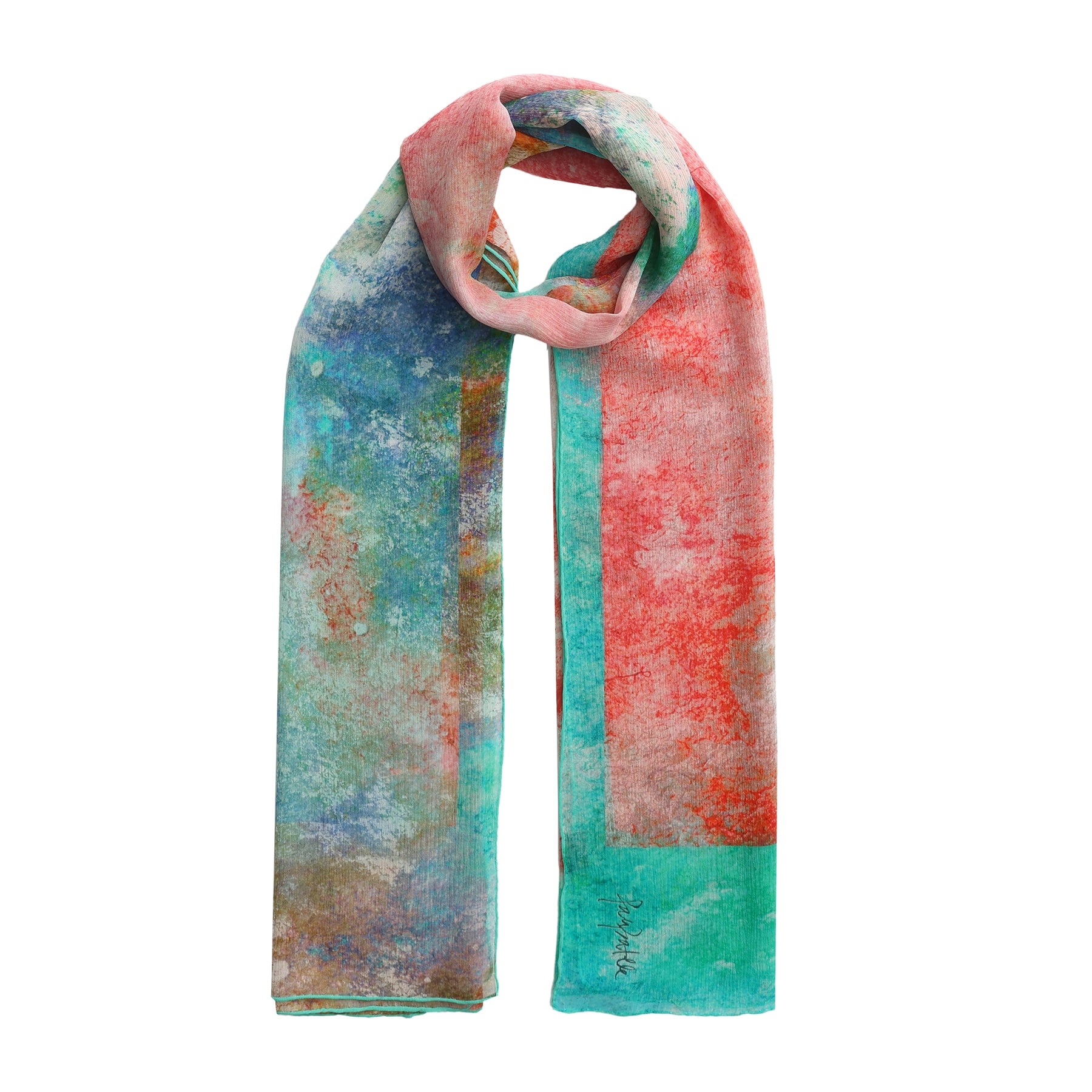 The Multicolor Silk Scarf Fucsia Paradis is a long, rectangular Mediterranean silk accessory with vibrant abstract patterns in red, teal, blue, and brown—wearable art that adds bold color to your look.