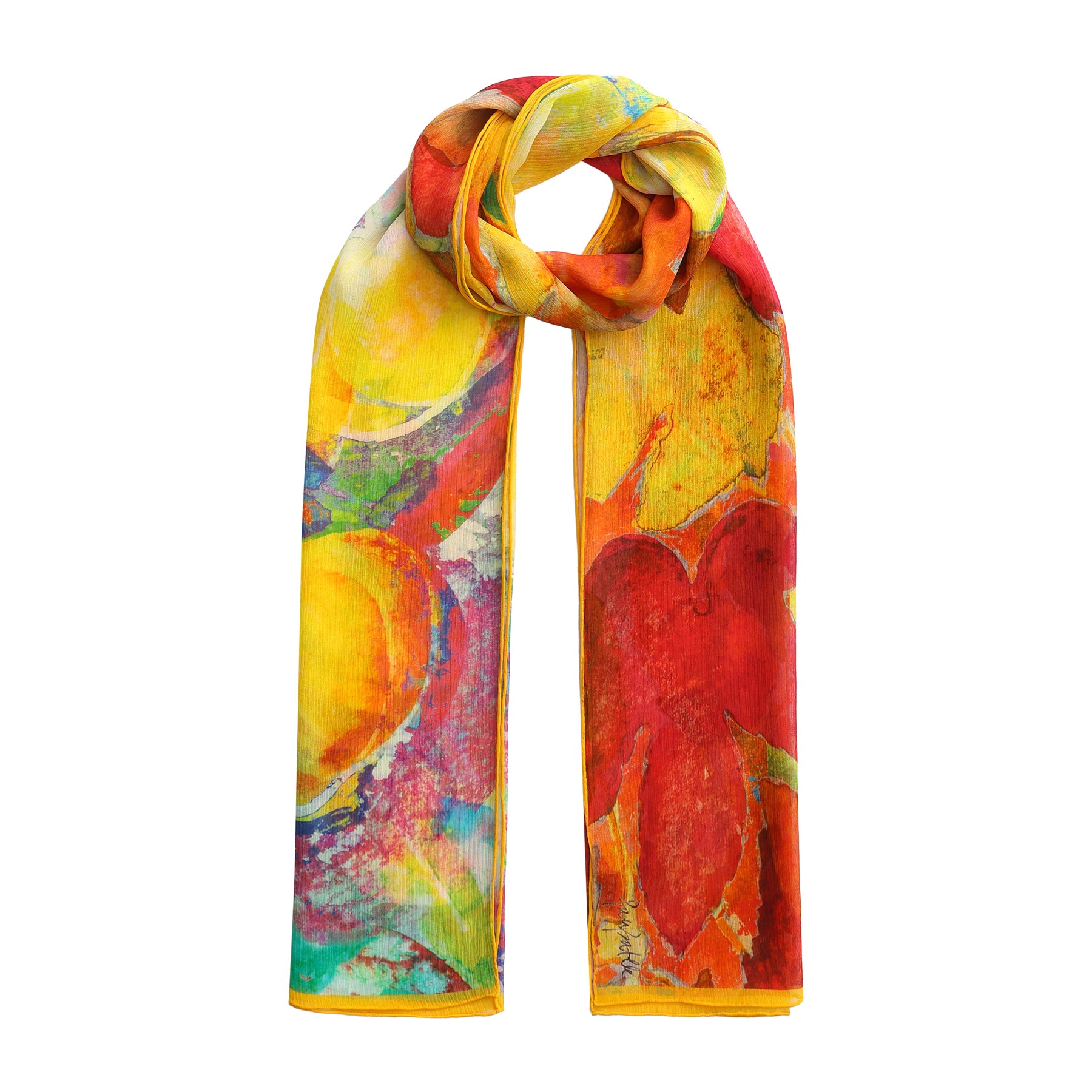 The Multicolor Silk Scarf Demeter features a vivid abstract floral pattern in red, yellow, orange, and green—wearable artwork inspired by Mediterranean charm, artfully tied in a simple loose knot at the top.