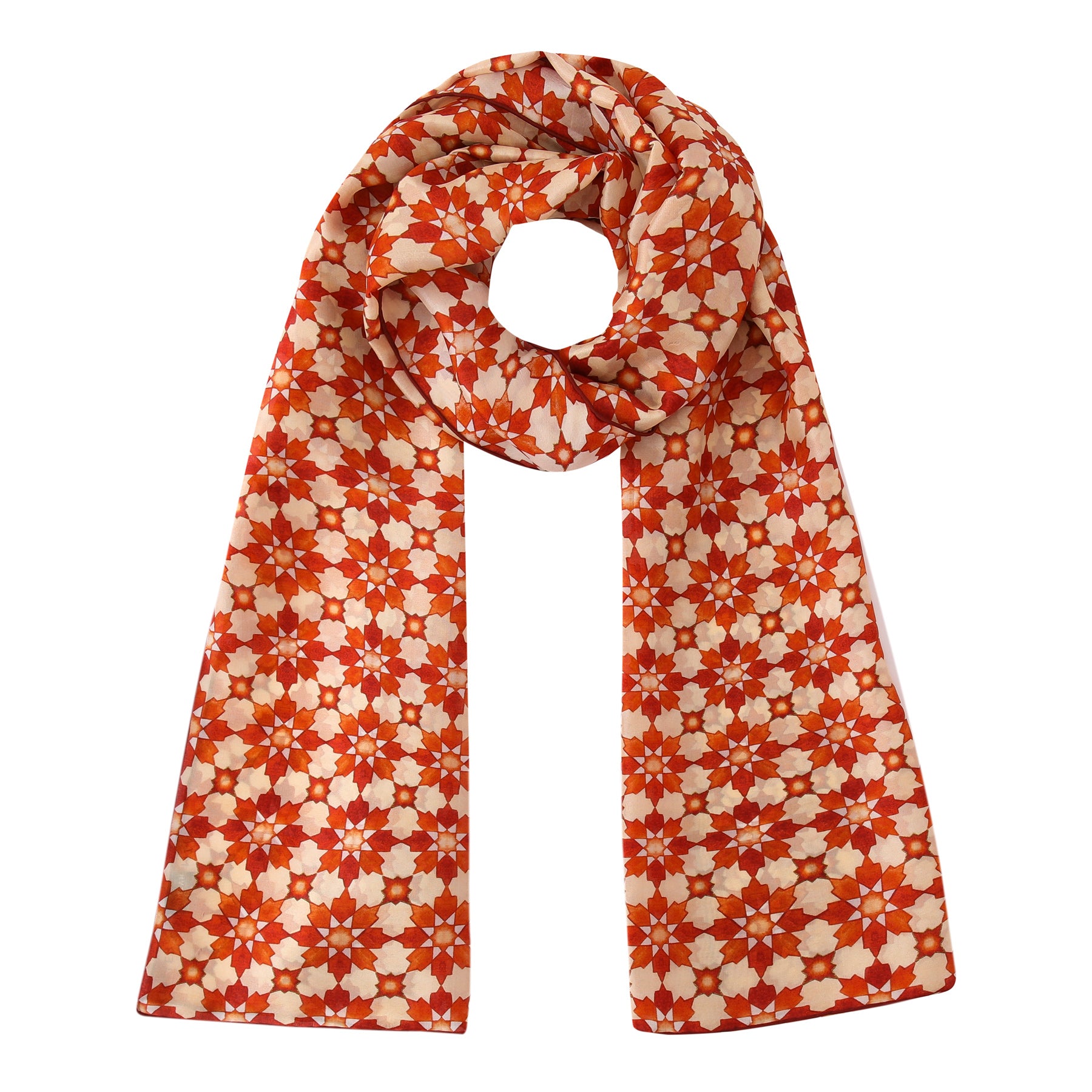 The Orange Silk Scarf with Islamic Print Cosmo features a red background adorned with cream and orange floral motifs inspired by Andalusian art, neatly arranged and displayed against a white backdrop.