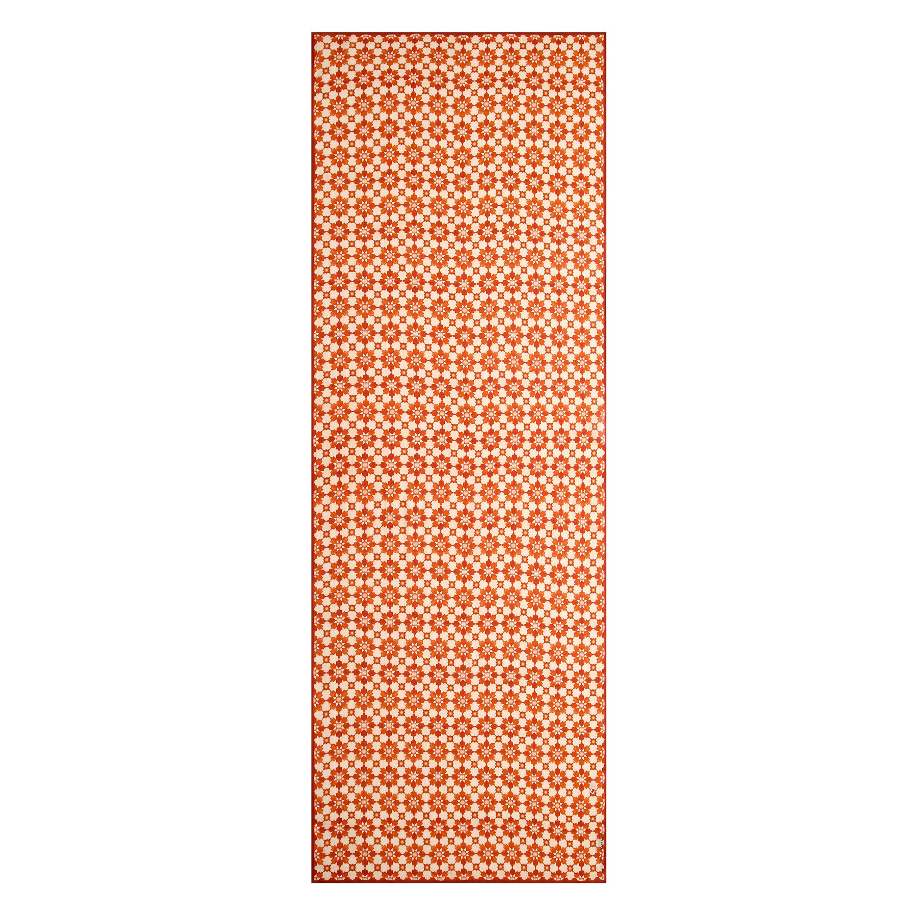 An orange scarf featuring an Islamic pattern print with a repeating geometric design of beige and orange hexagons and stars on a red background, inspired by Alhambra motifs.
