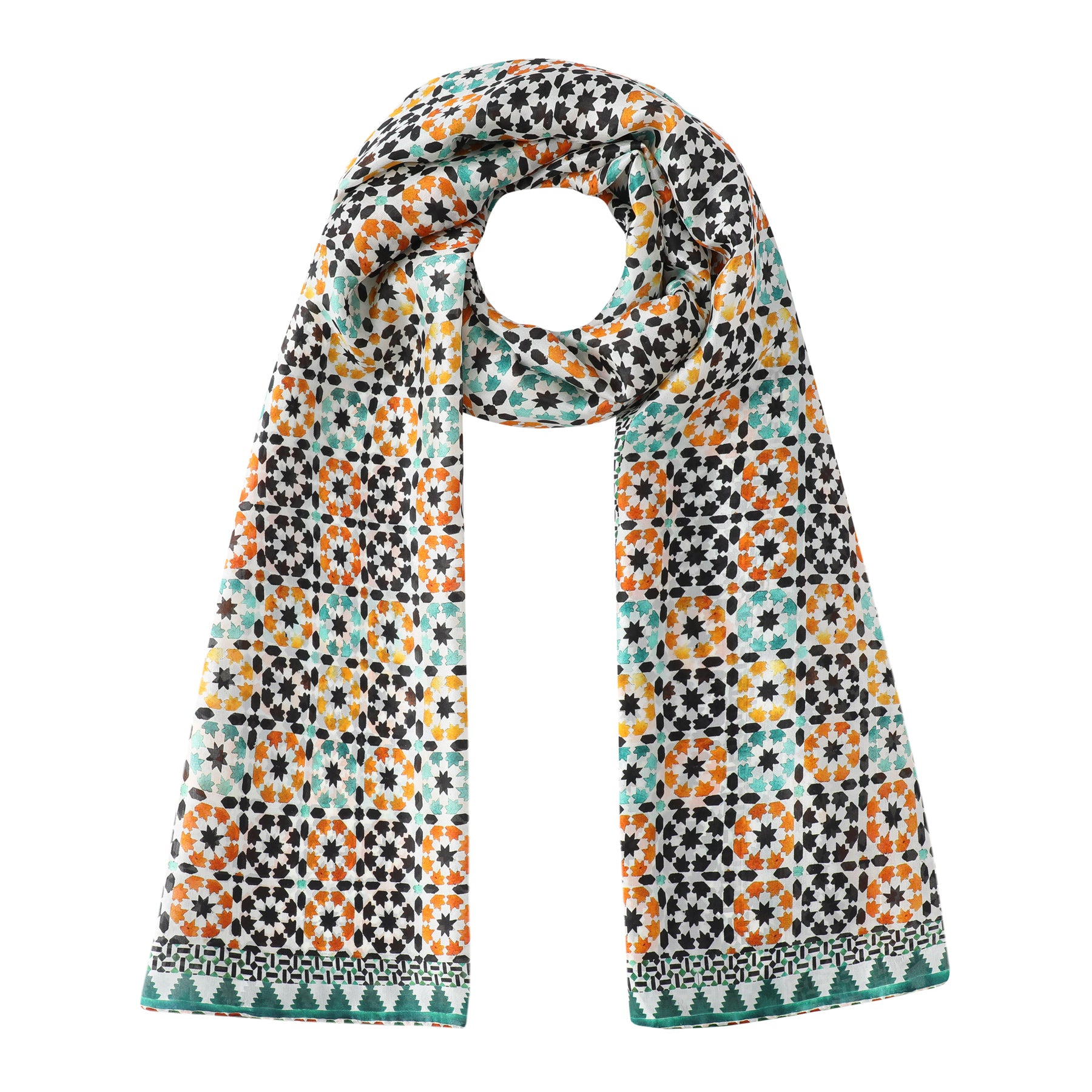 The Green and Orange Silk Scarf Sabika features a geometric Moroccan-inspired pattern in orange, yellow, black, turquoise, and white with green borders. Star and diamond shapes make it a bold summer accessory for effortless style.