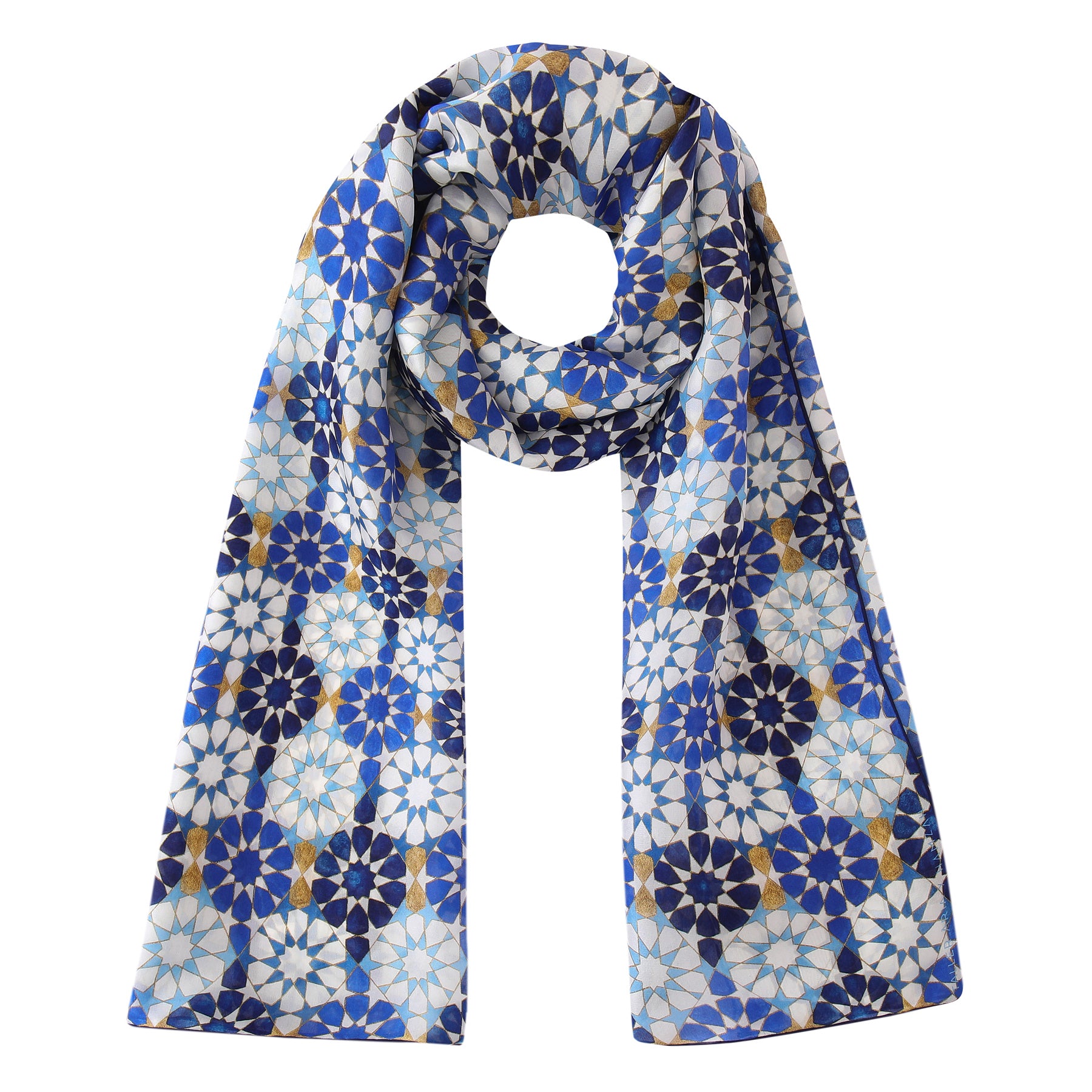 The Blue Silk Scarf with Islamic Pattern DalAhorra features Andalusian geometric floral designs in blue, navy, gold, and white. Displayed in a loop with both ends hanging down, it offers elegant silk style.
