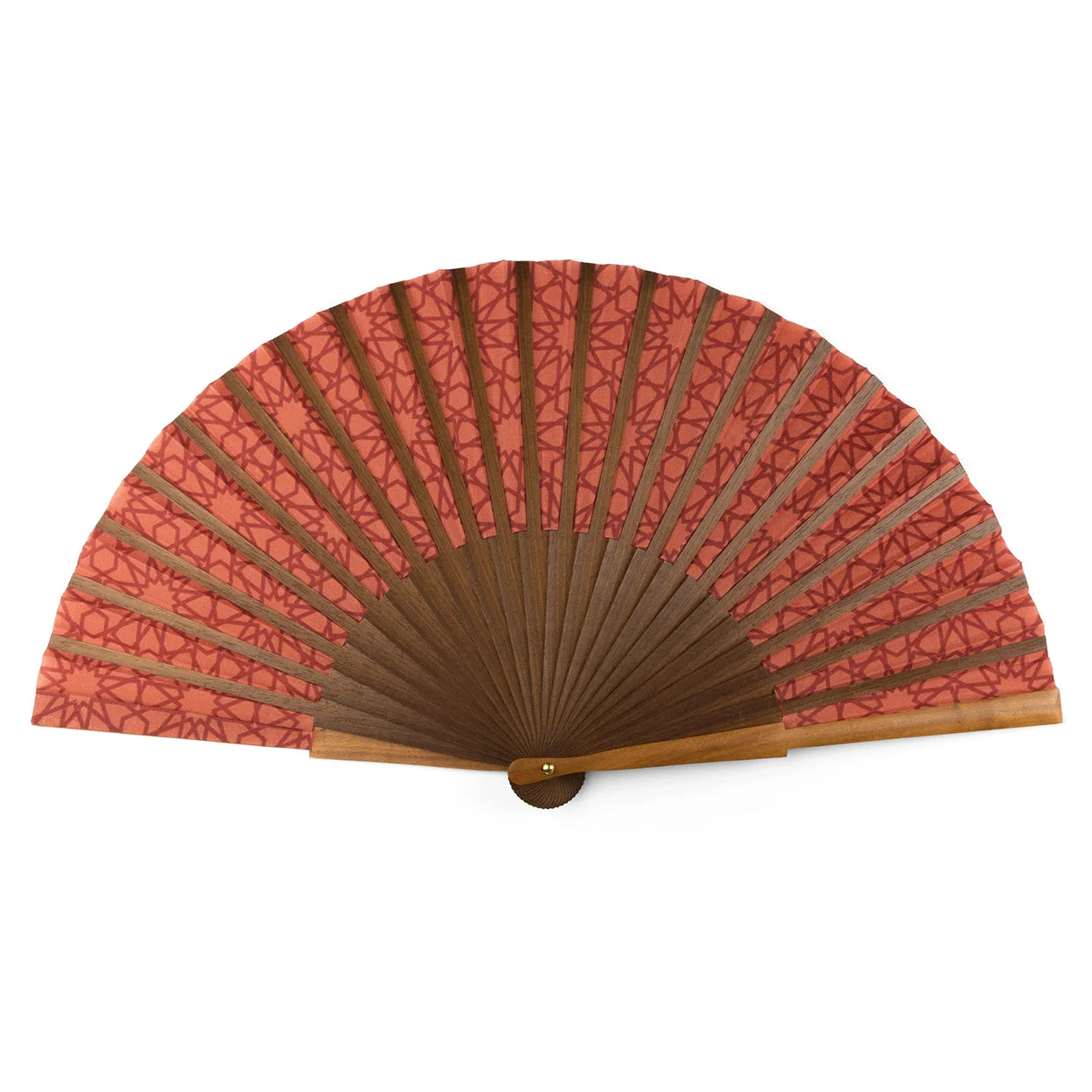 The Red folding fan Dalila features brown wooden ribs and a pinkish-red paper leaf with an Islamic geometric floral pattern. Made in Spain, it is shown fully opened against a white background.