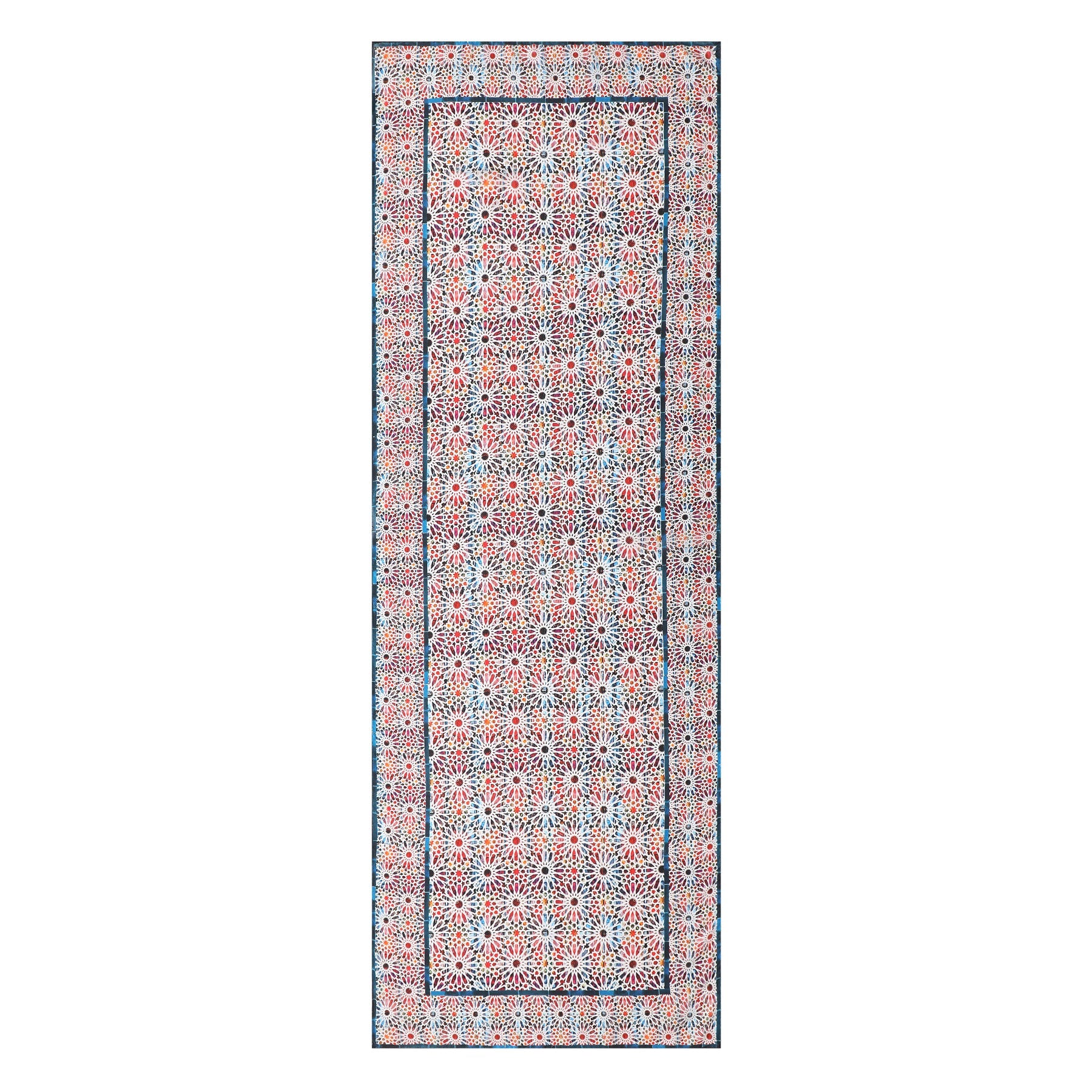 The Multicolor Silk Scarf Sakina features detailed geometric patterns inspired by Islamic art in red, blue, and white, with intricate star and floral shapes throughout its design.