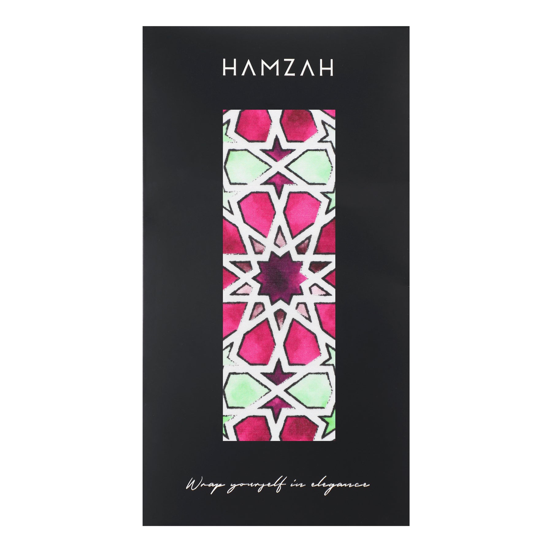The Long Pink Silk Scarf Fatima, featuring a pink, white, and green Islamic mosaic tile pattern, is displayed vertically in black packaging labeled “HAMZAH” at the top and “Wrap yourself in elegance” at the bottom in white text.