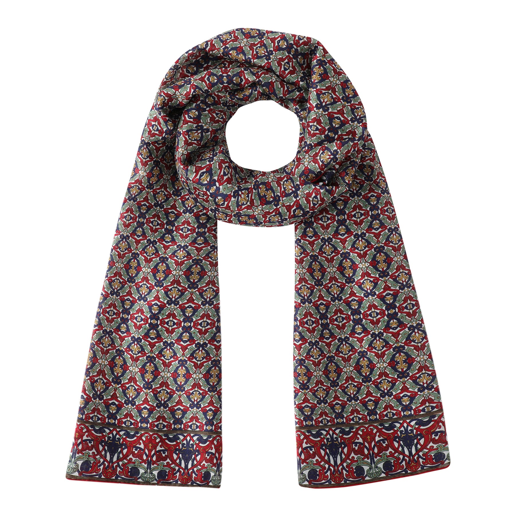 The Burgundy Silk Scarf with Geometrical Print Sultana showcases intricate eastern motifs in red, blue, green, and yellow on silk, styled in a loop with ends laid flat.