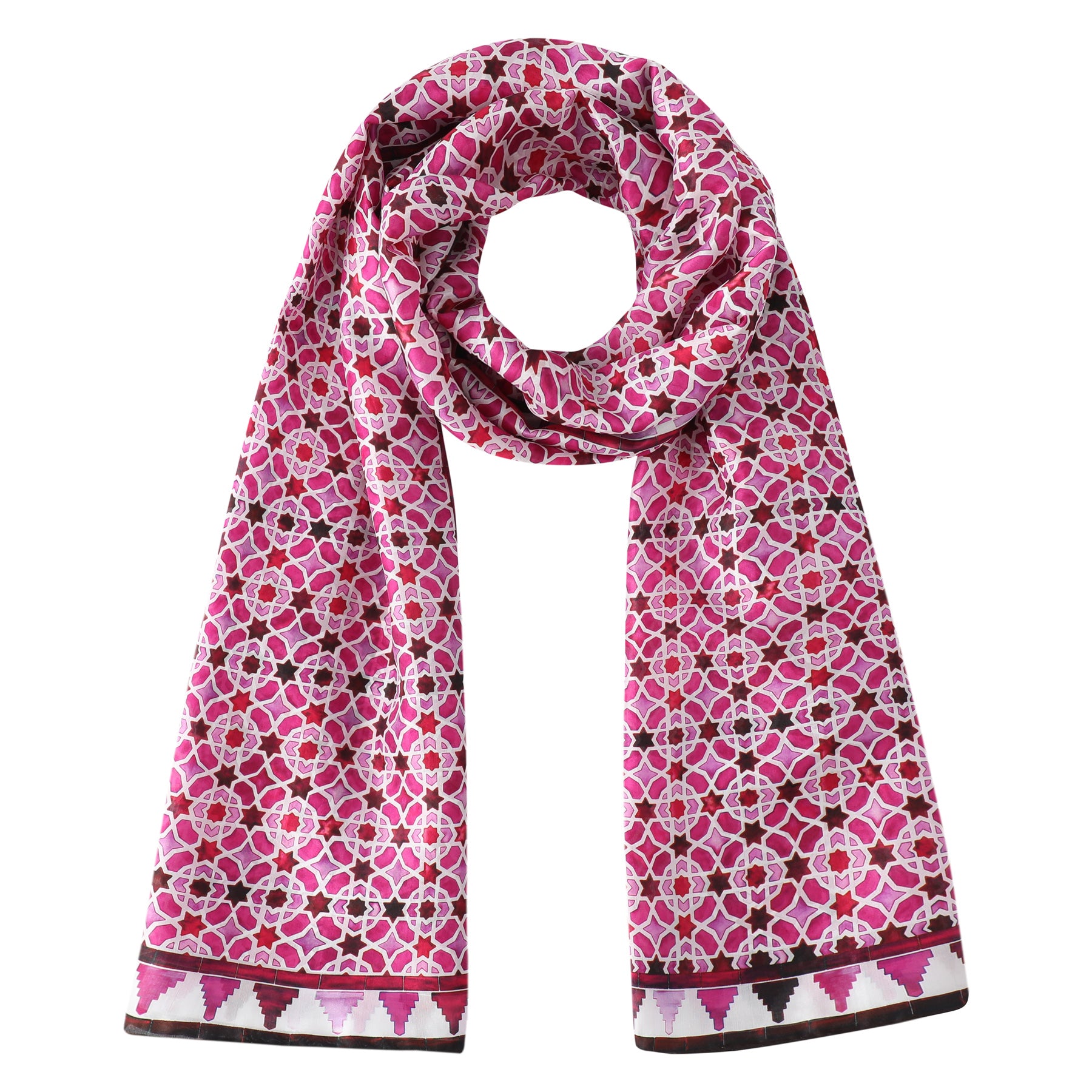 The Pink Silk Scarf Alcázar features a white, red, and magenta geometric Islamic Art-inspired print with a pink, black, and white decorative triangular border. The scarf is styled in a circular loop.