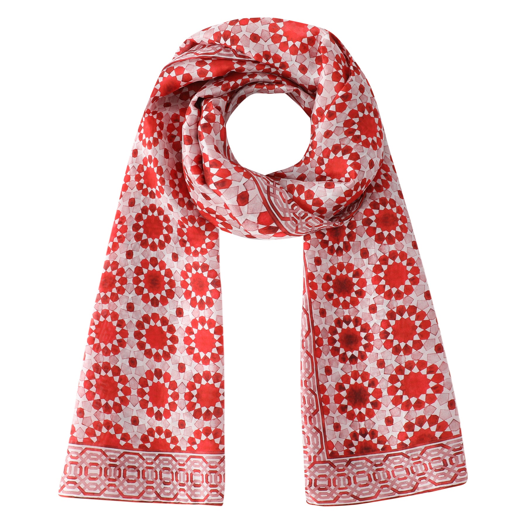 The Moroccan Inspired Red Silk Scarf Najma is a lightweight silk scarf with a red and white geometric circular pattern and decorative borders, arranged in a loop for a luxurious, Moroccan-inspired accent to any outfit.