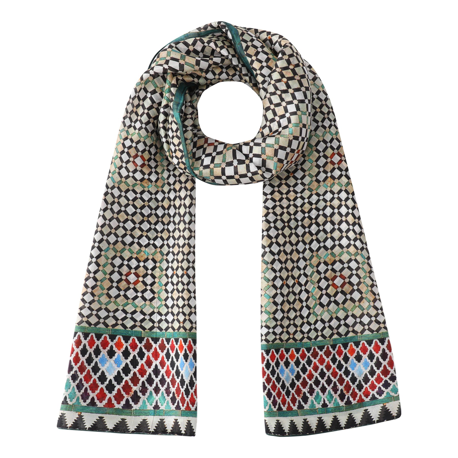 The Colorful Large Silk Scarf Hub is a long silk scarf with Moorish tile-inspired geometric patterns in black, white, and green squares plus red and blue diamond designs near the ends, neatly looped at the center.