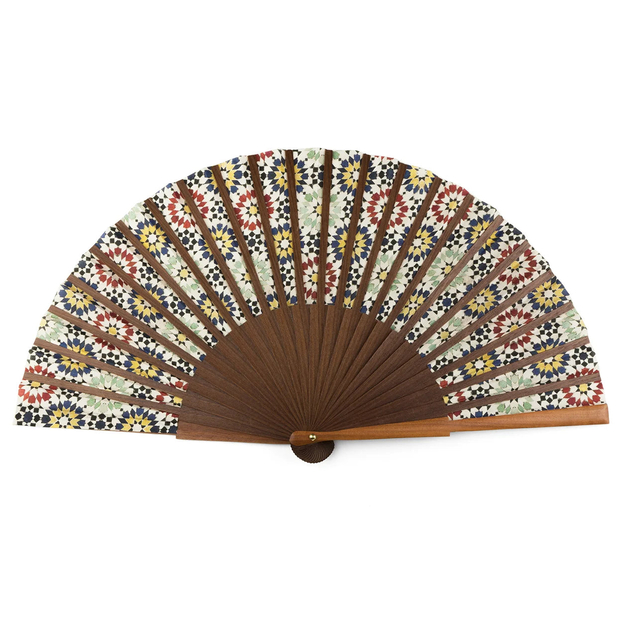 The Moroccan tiles inspired Silk & Wood hand fan Fezi, handmade in Spain, features dark wooden ribs and a silk leaf with vibrant geometric floral patterns in red, yellow, green, blue, and white. The fan is fully opened and displayed on a white background.