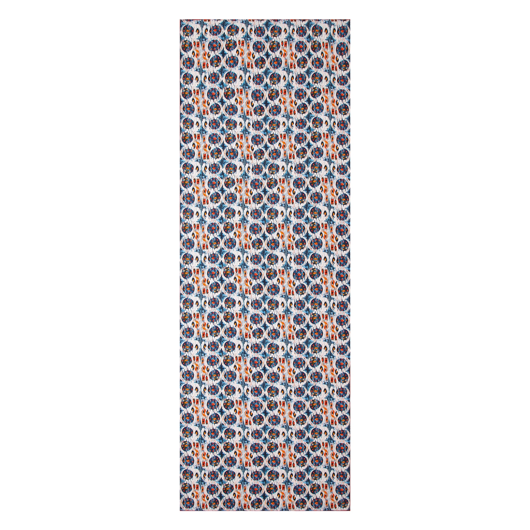 A rectangular white and blue Habotai silk scarf featuring an Ikat print with repeating geometric and floral patterns inspired by Indonesian designs.