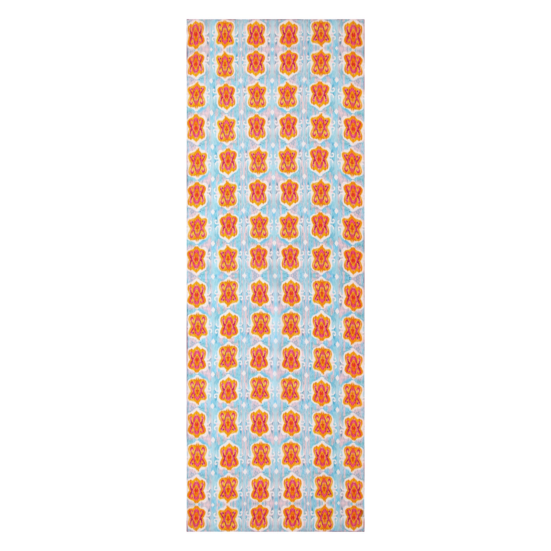The Light Blue Silk Scarf with Ikat Print showcases a repeating pattern of red, orange, and yellow floral motifs arranged in a grid on a pale blue background, drawing inspiration from classic Indonesian designs.