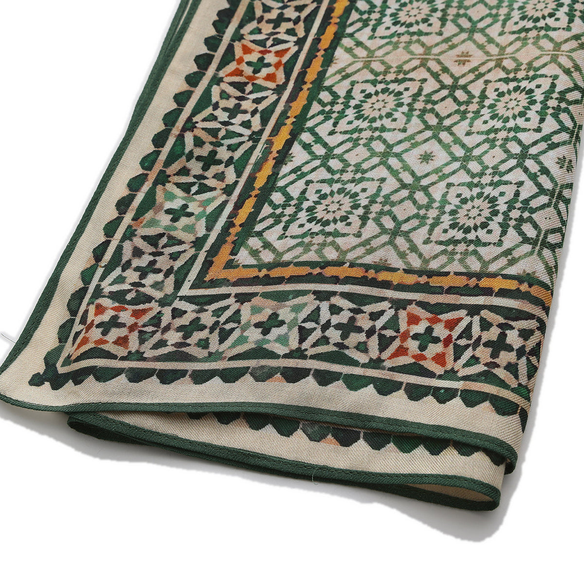 Corner of the Green Modal Scarf Alhambra Lattice Azahar with the Hamzah woven label