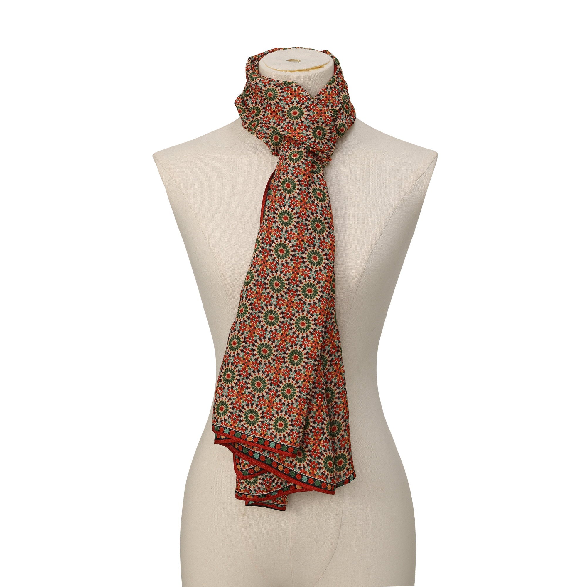 Red and Green Modal Scarf Mosaic Rosettes Zubaida draped around the neck on a mannequin bust