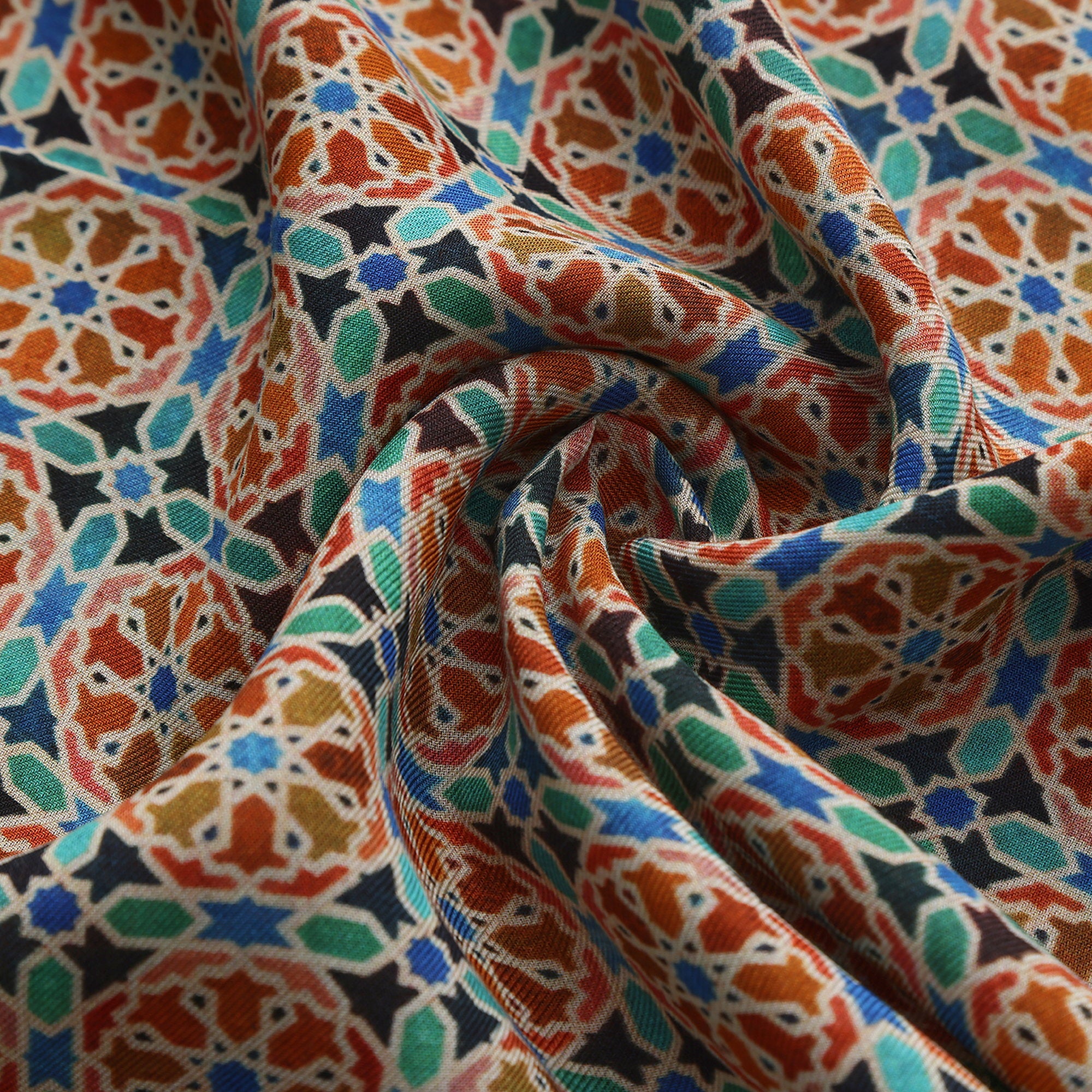 Close-up of the 057 modal print: the orange wheels and turquoise fill on black