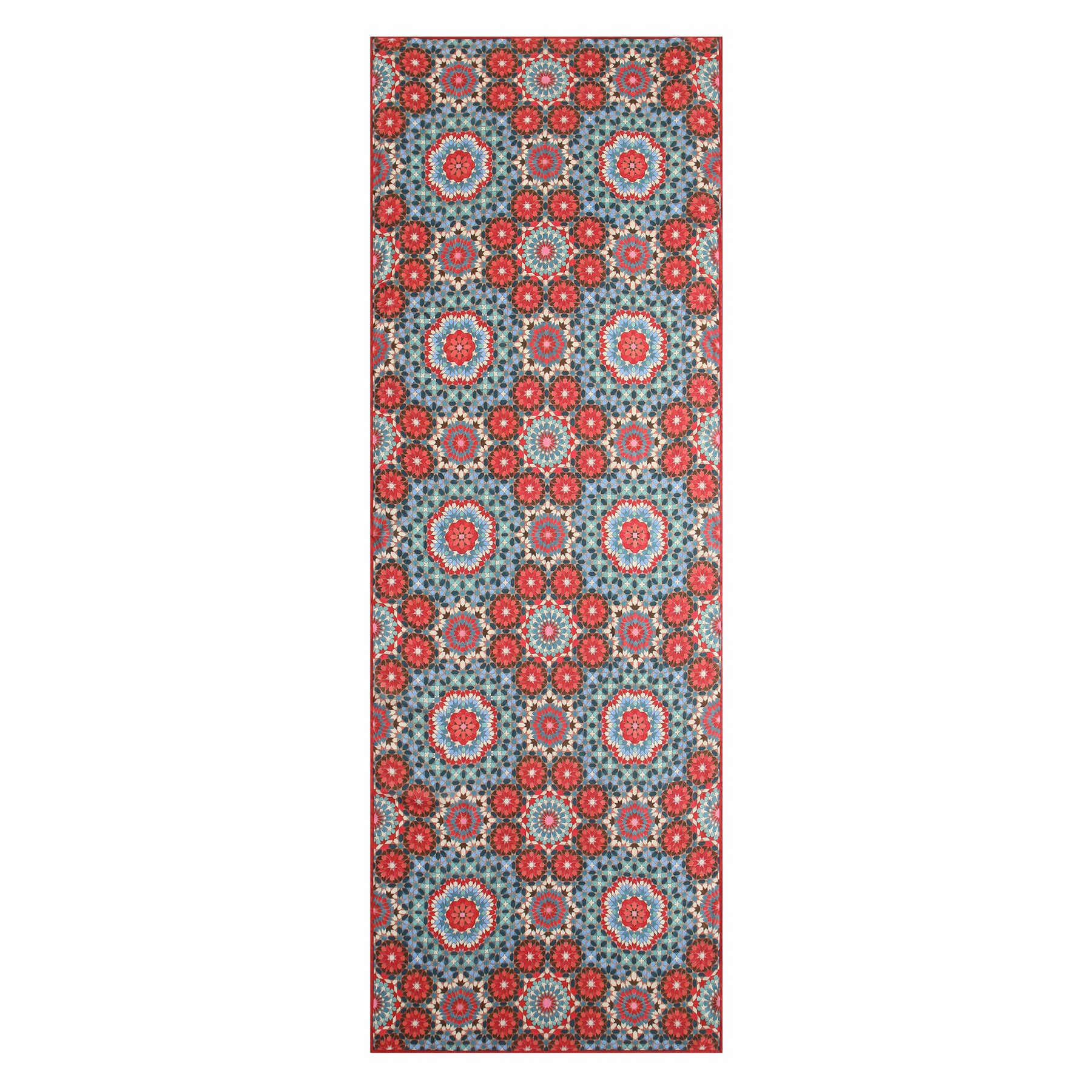 A multicolor scarf inspired by Alhambra tiles, showcasing repeating red, blue, and white circular floral motifs on a dark background.