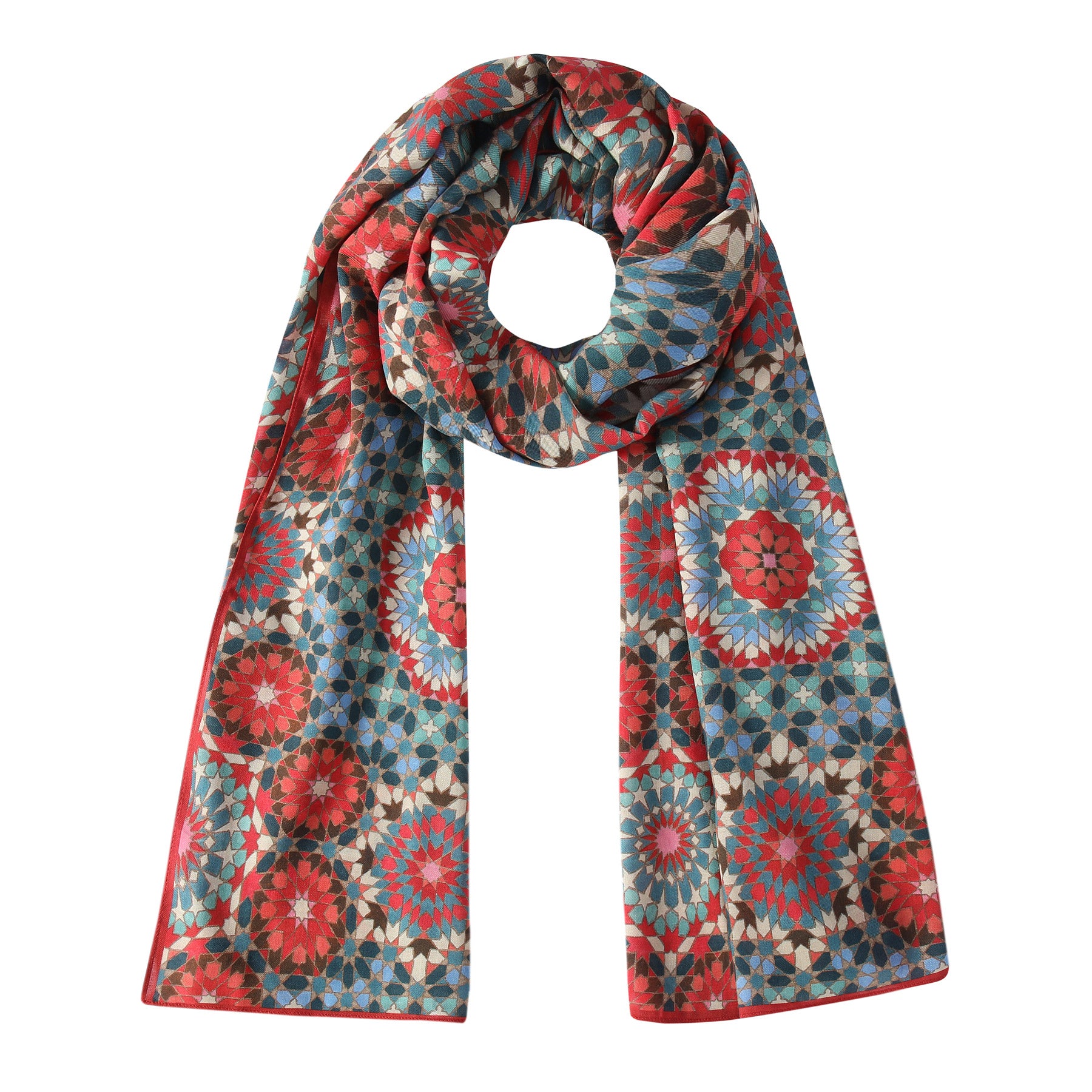 The Multicolor Scarf Inspired by Alhambra Tiles features a geometric mosaic pattern in red, blue, teal, and beige tones, shown looped against a white background.