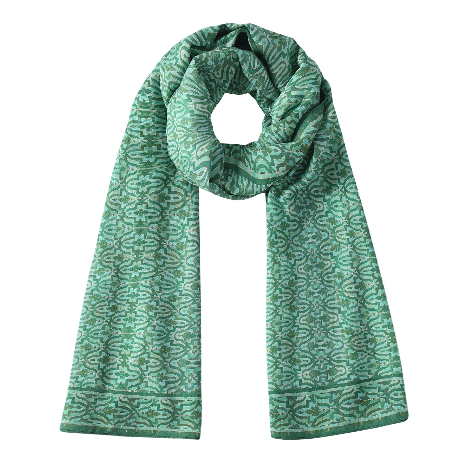 The Green Scarf for Women with Geometric Print features an intricate light green Islamic-inspired pattern, styled in a loop with draped ends, and displayed on a white background.
