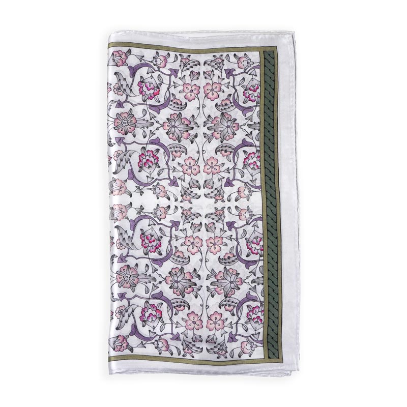 The Hamzah Gray Silk Scarf with Ottoman Floral Print Halkar showcases ornate pink, purple, and gray flowers with swirling vines on a white background, bordered by a green stripe featuring a simple geometric design.