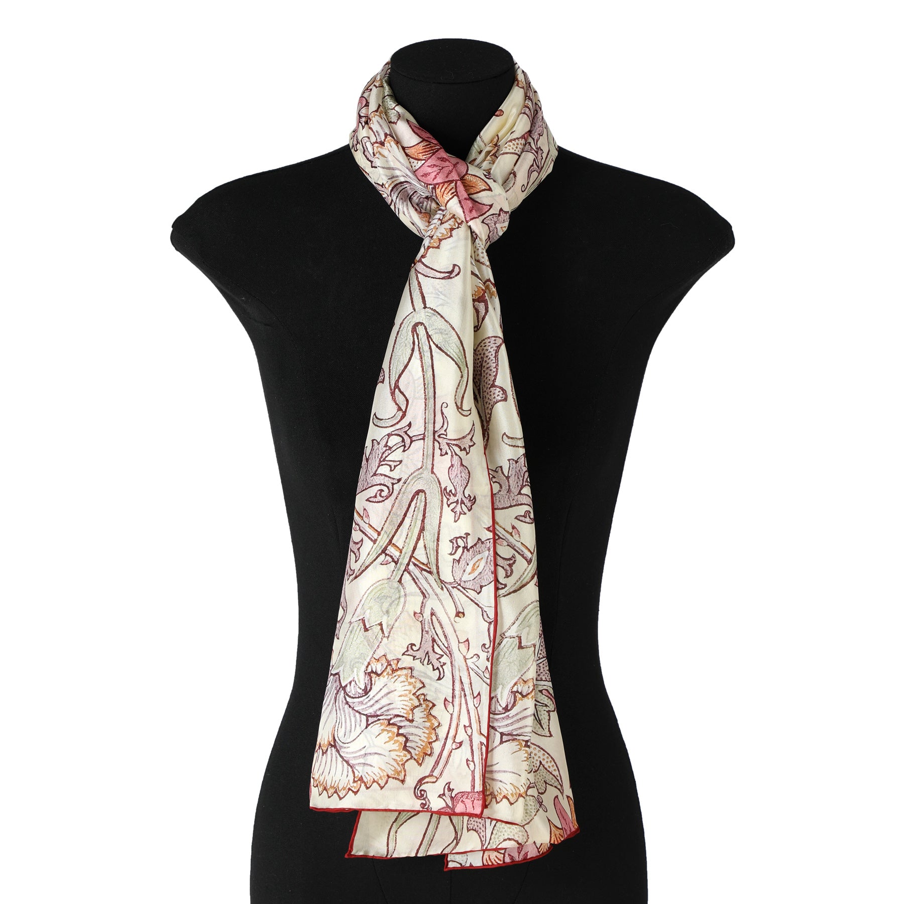 A mannequin displays the Hamzah W. Morris Art Nouveau Scarf, made of 100% Habotai Silk, featuring an intricate floral design in muted red and beige tones, elegantly draped around its neck.