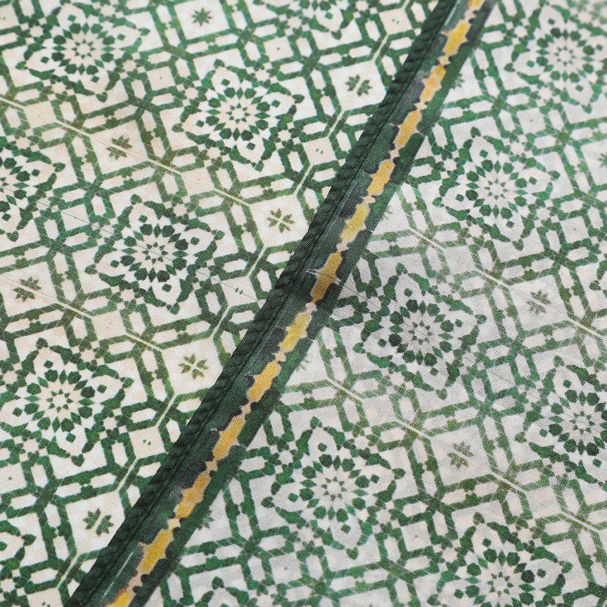 Border and hand-rolled edge detail of the Green Silk Square Scarf Azahar