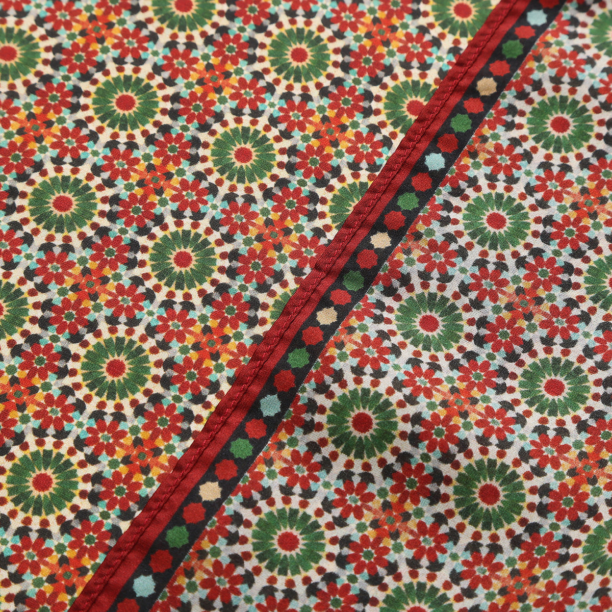 Border and hand-rolled edge detail of the Red and Green Silk Square Scarf Zubaida