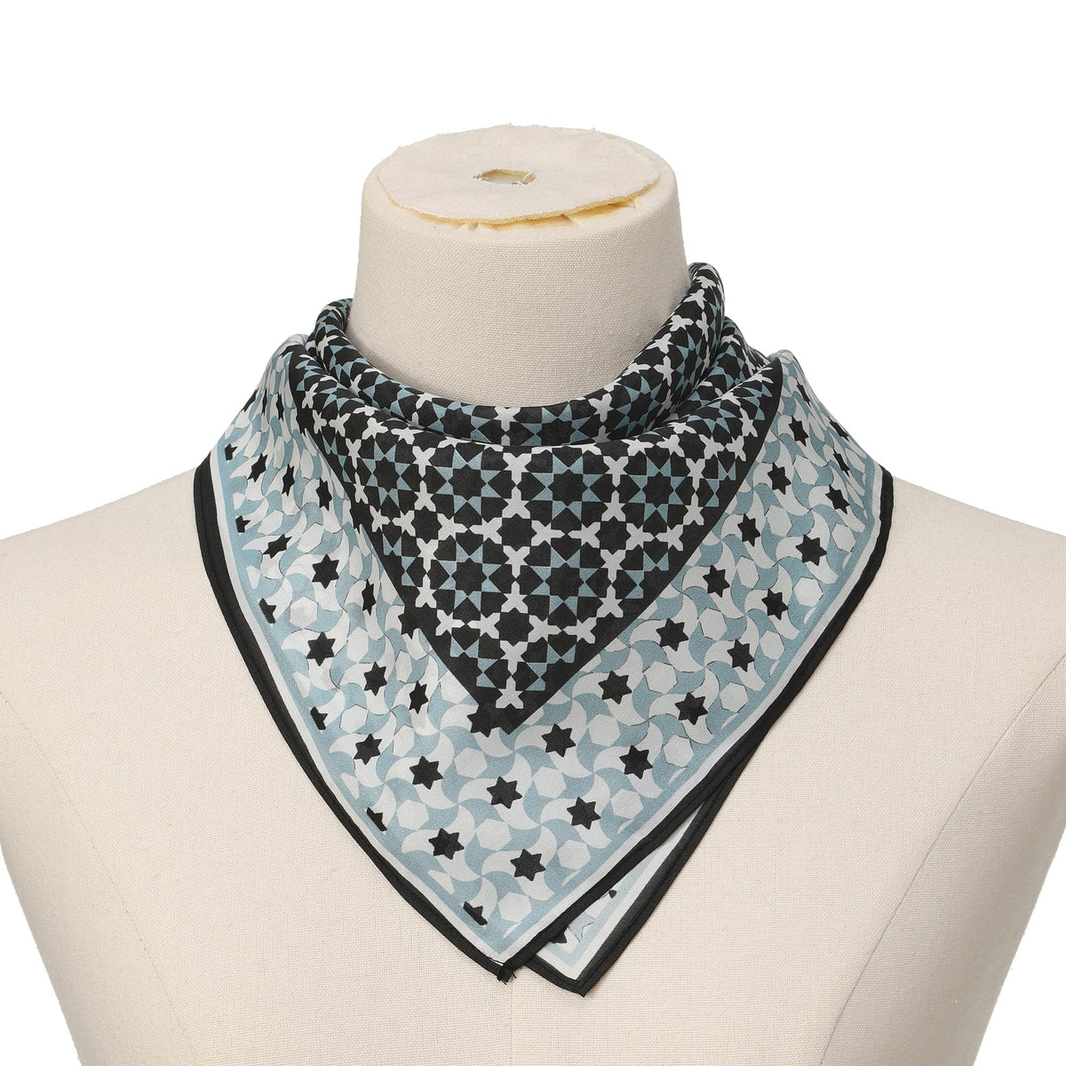 Black and Grey Silk Square Scarf Zoraida tied at the neck on a mannequin bust