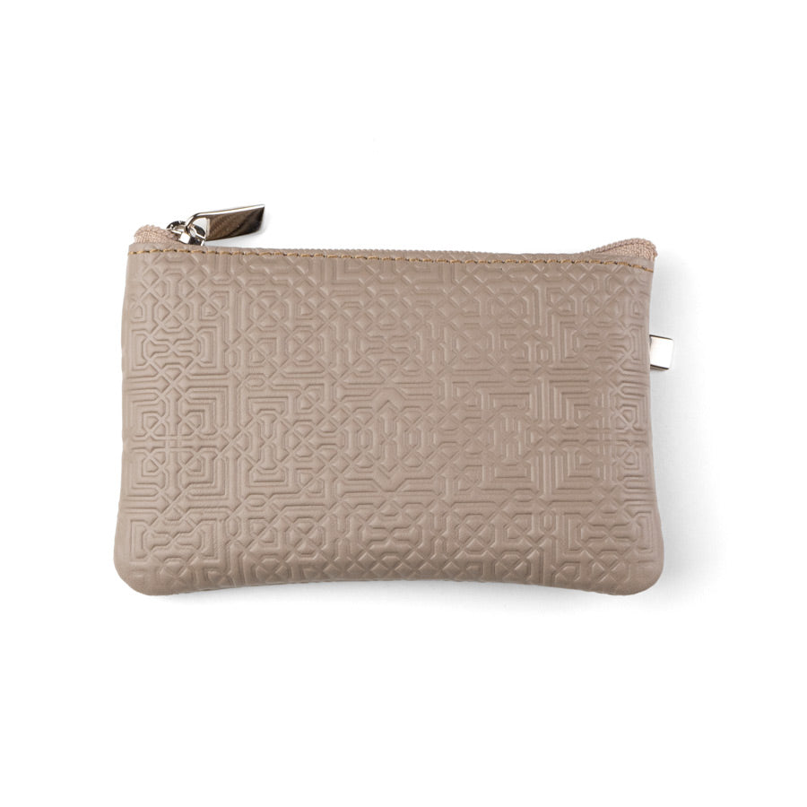 Munira Leather’s Taupe Leather Coin Purse with Keychain features a geometric embossed design and zippered closure, displayed on a white background.