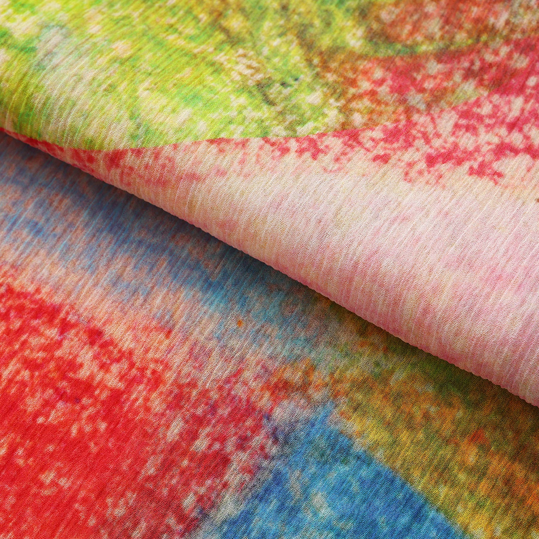 A close-up of the Multicolor Silk Scarf Calidoscopic, highlighting its fine silk texture and delicate weave—truly a vibrant piece of wearable art.