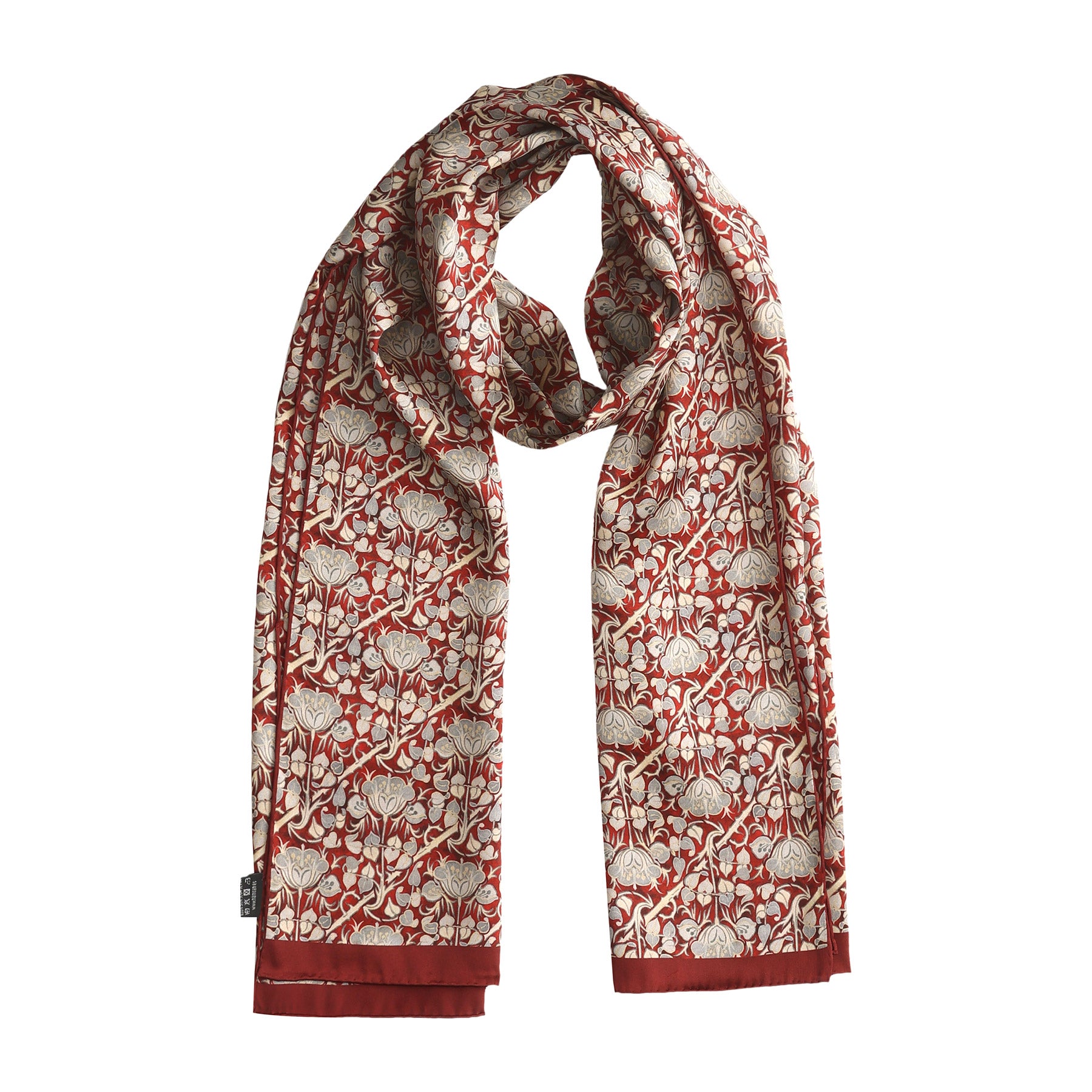 Long burgundy and gray scarf adorned with roses print, loosely wrapped to highlight its intricate pattern and rich colors.