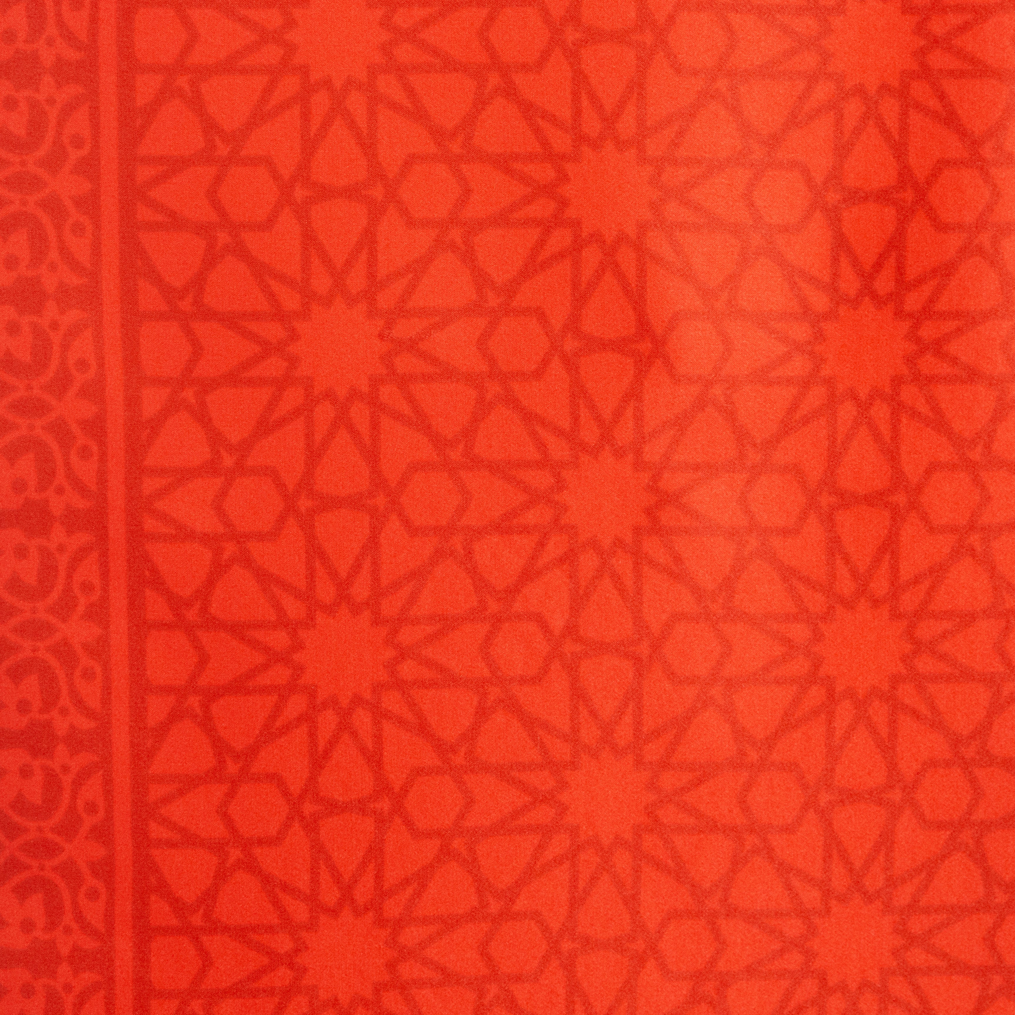 The Red Silk Square Scarf Dalila is handcrafted in Turkey with a geometric star and hexagon pattern, a decorative left border, and traditional, symmetrical detailing for an intricate look.