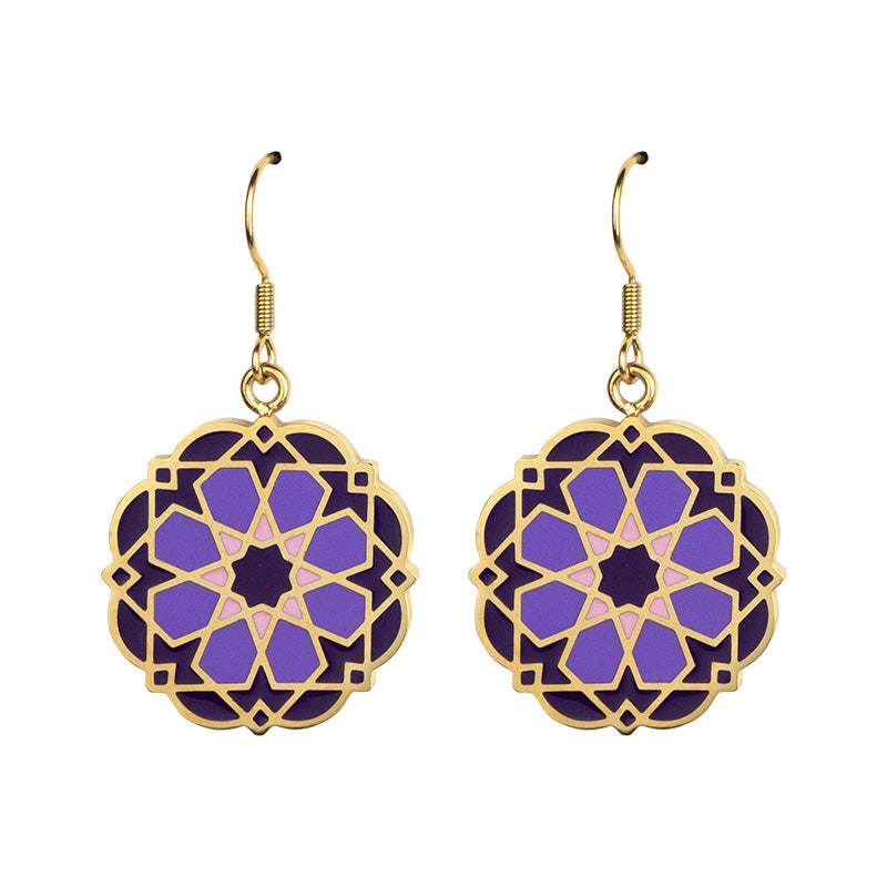 Gold Plated Earrings Nazari Purple feature a geometric, flower-inspired design with 14k gold plated outlines and hand-painted purple enamel, suspended from gold hooks for an elegant statement look.