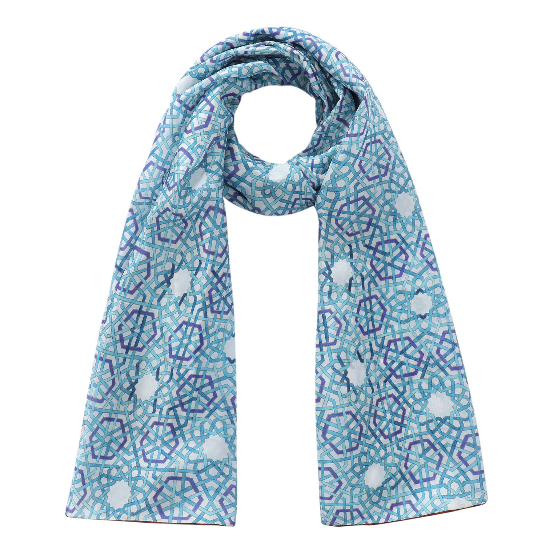 The Hamzah Islamic Motifs Silk Scarf Hijaz V1 features a geometric pattern inspired by Islamic art, in blue and purple on a light background. It elegantly blends circular and angular shapes in a loop, with ends hanging gracefully.