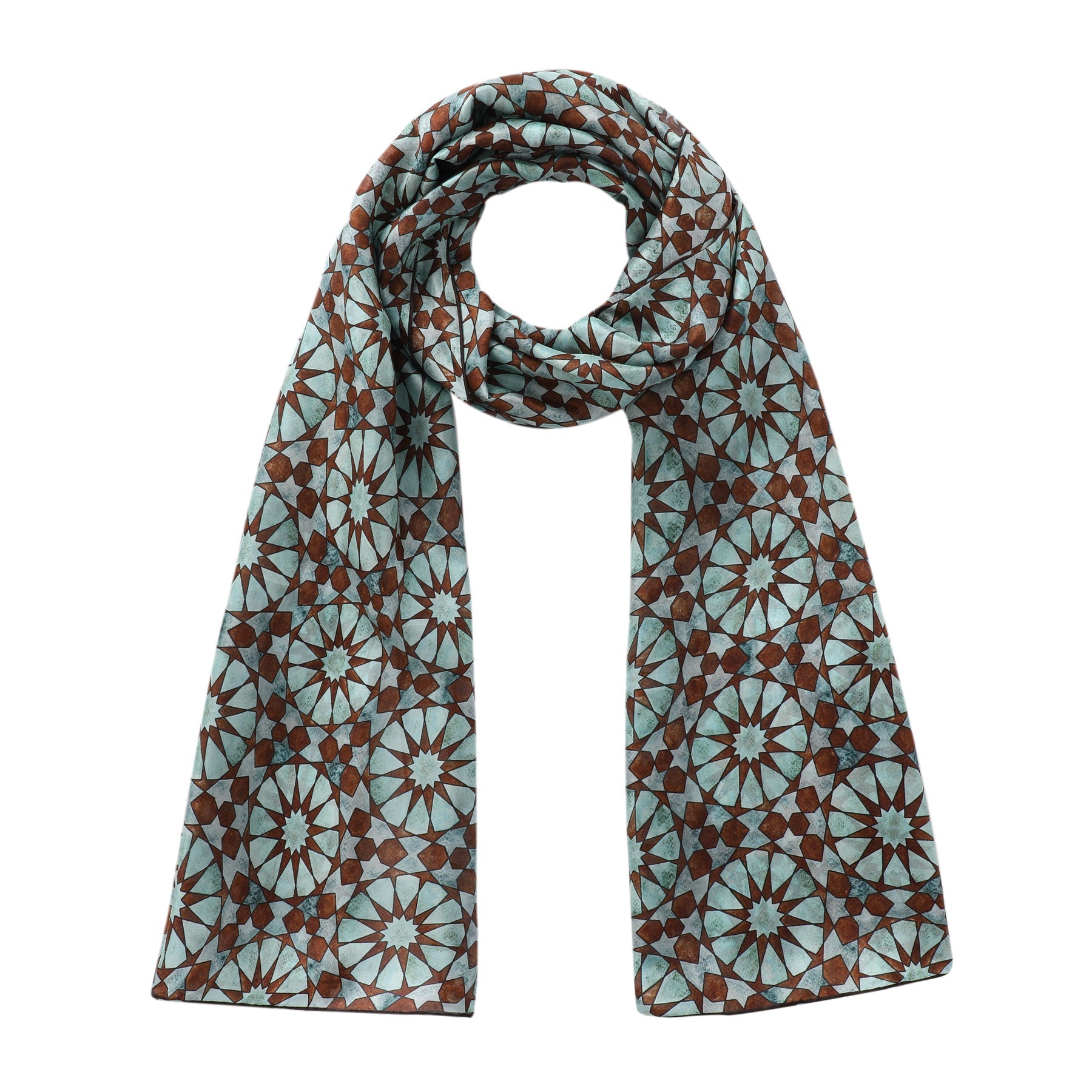 The Hamzah Islamic Pattern Tiles Silk Scarf Muqarnas V1 features a luxurious habotai silk fabric with an intricate geometric design of teal and brown starburst shapes, reminiscent of Islamic pattern tiles, arranged in a symmetrical lengthwise loop.