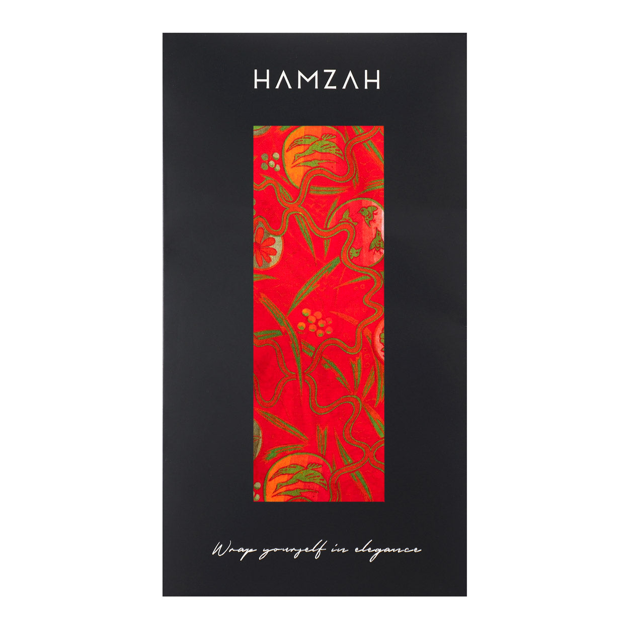 A rectangular gift box with HAMZAH at the top displays the Red Silk Scarf with Abstract Floral Print Kabuki in vibrant hues through a vertical window. At the bottom, it says: Wrap yourself in elegance.