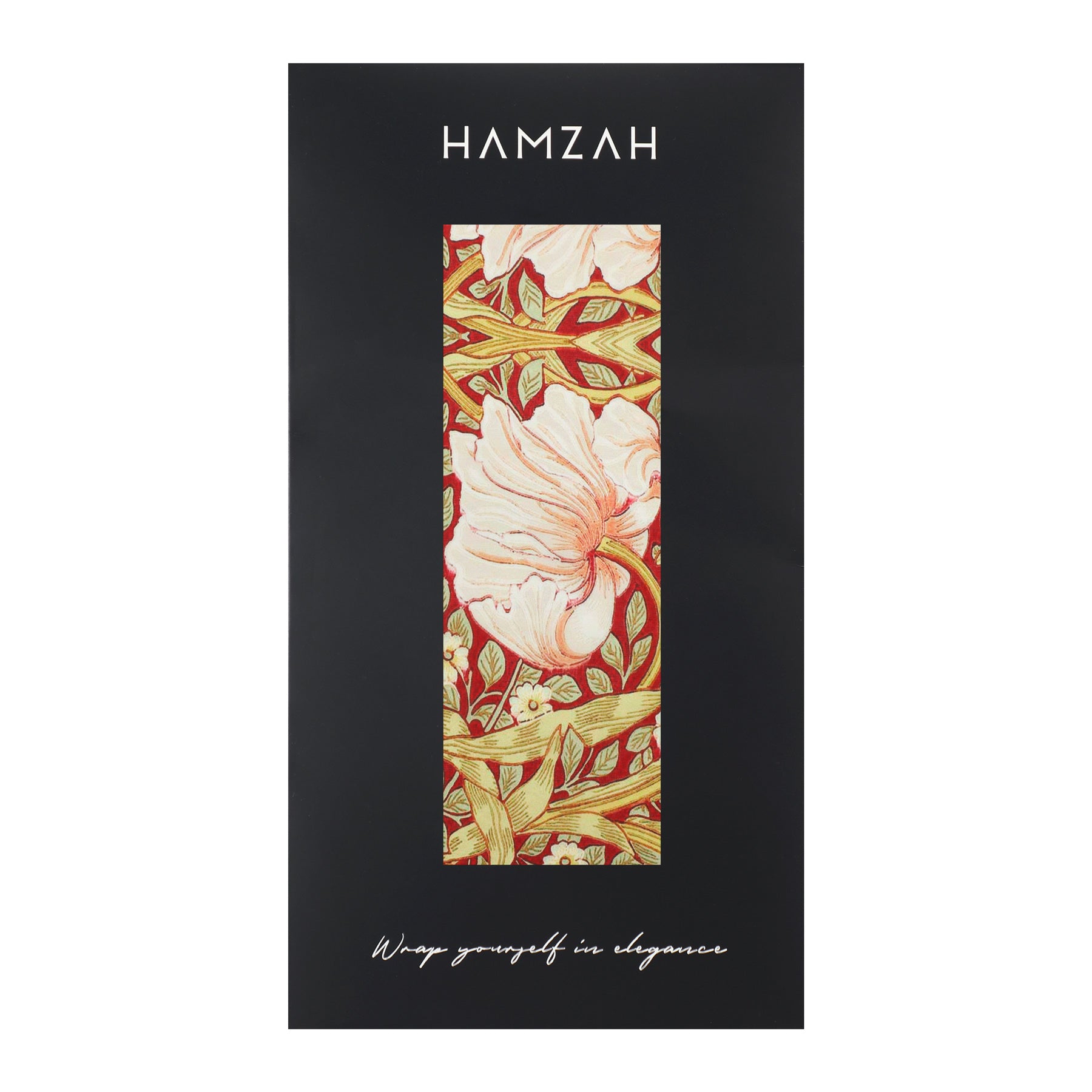 The William Morris - Habotai Silk Scarf Basile from Hamzah is packaged in a decorative HAMZAH box. It showcases white flowers and green leaves on a rich red background. The bottom of the box reads Wrap yourself in elegance.