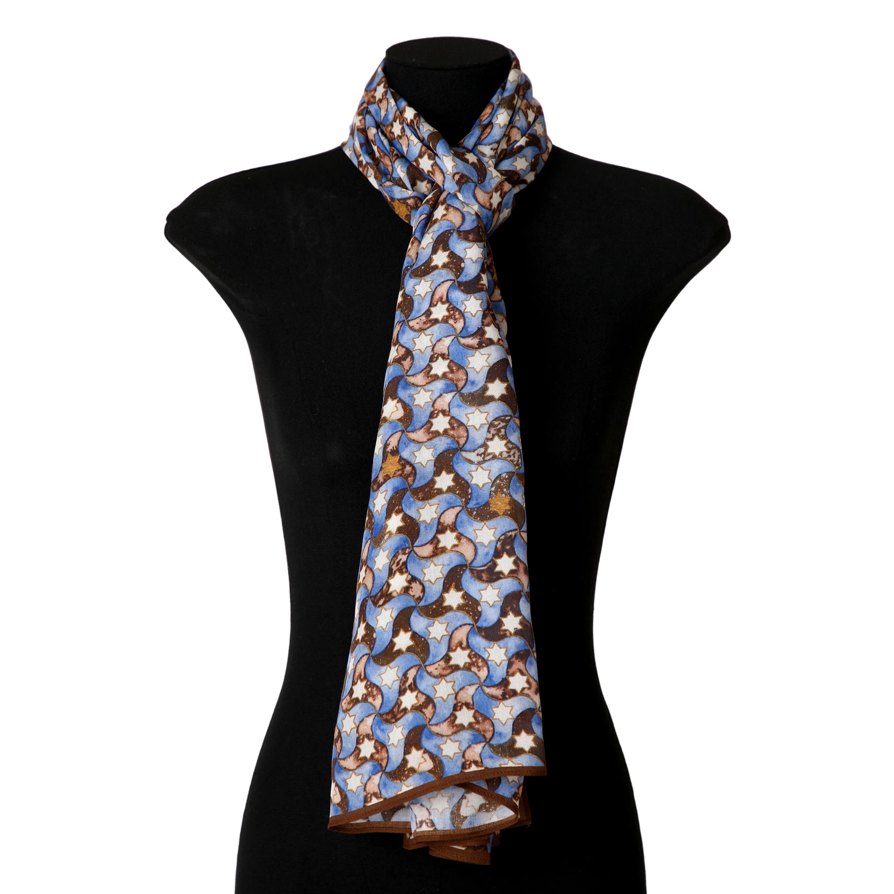 A Brown and Blue Scarf - 100% Modal, featuring a patterned design, is draped around the neck of a black mannequin torso with the ends hanging down the front.
