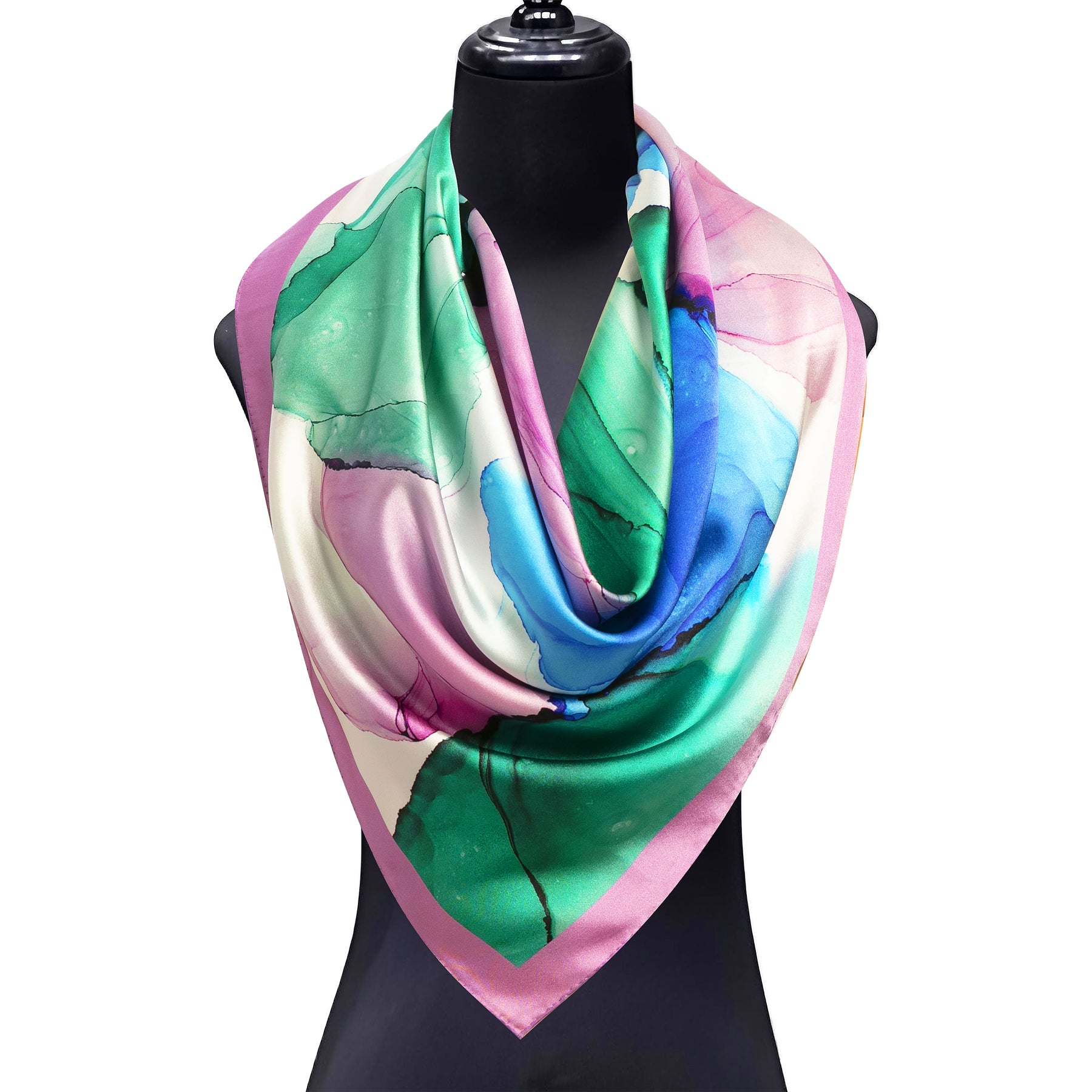 The Hamzah Purple Silk Scarf Square Fluid Art features an abstract watercolor print in green, blue, and white with a light pink border, elegantly draped on a black mannequin bust.