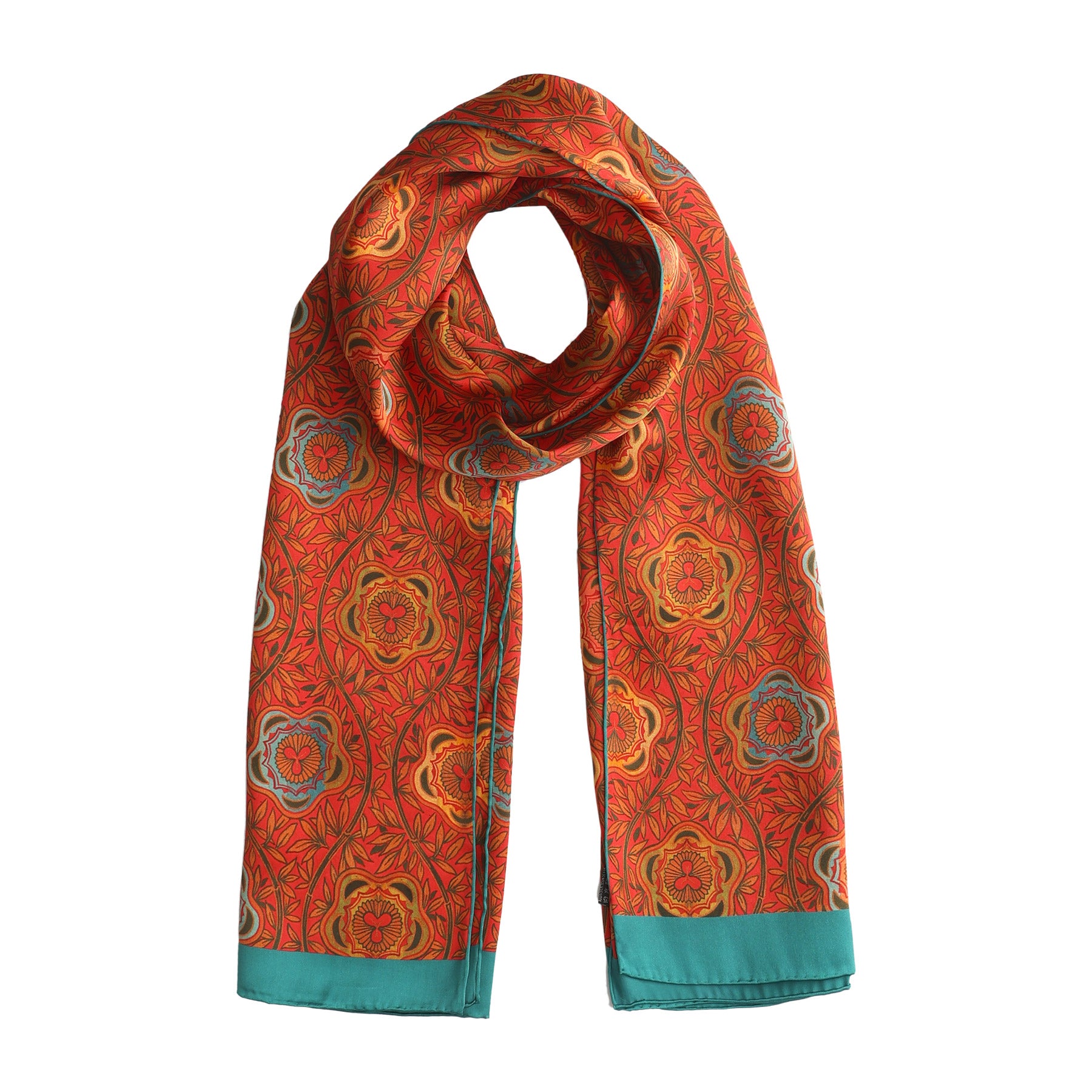 Red floral scarf displayed in a long loop, highlighting the bold orange, gold, and teal motifs against the vibrant background.