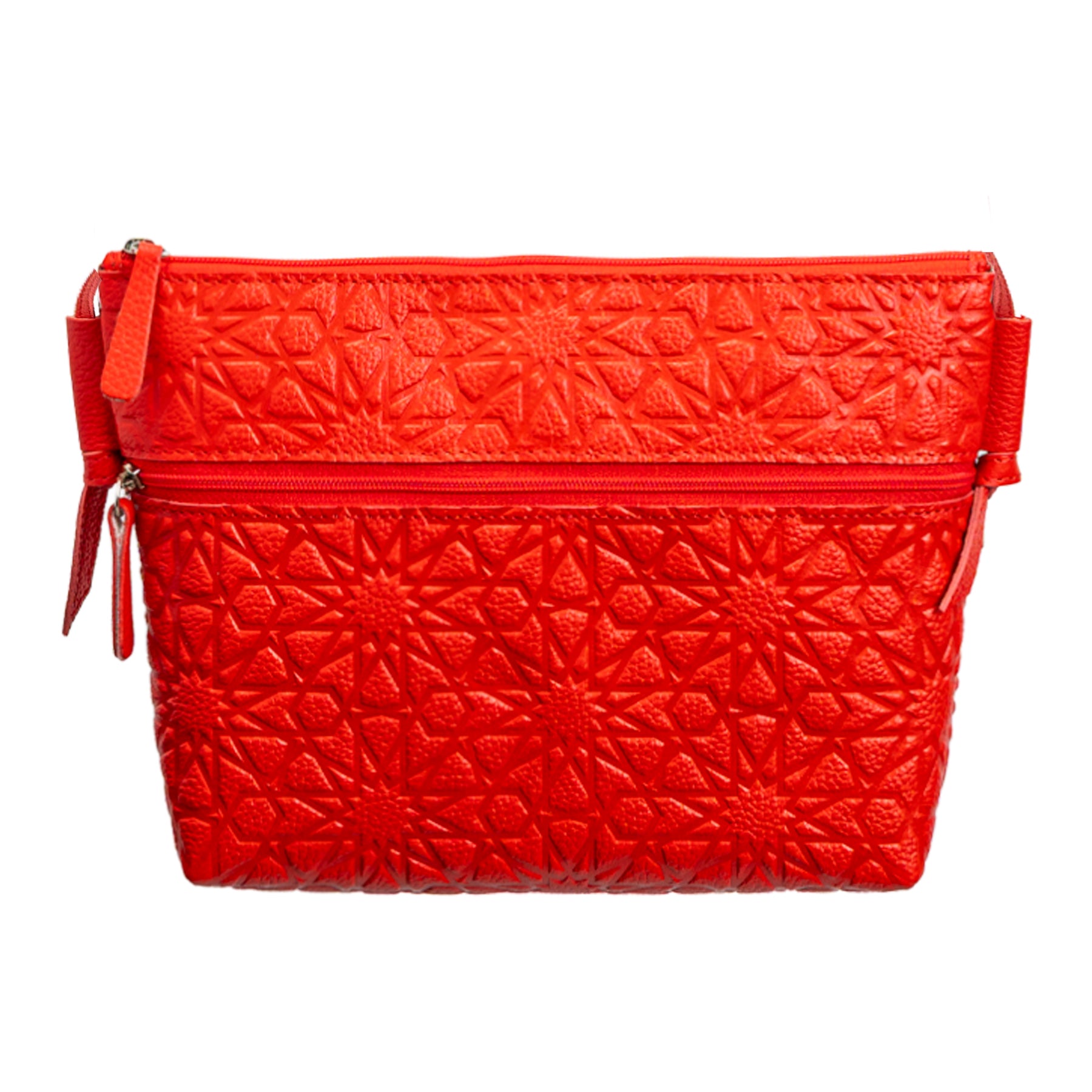 The Red Embossed Crossbody Bag with Islamic Design Pattern features a bright red embossed leather exterior, top zipper closure, and an additional front horizontal zip pocket.